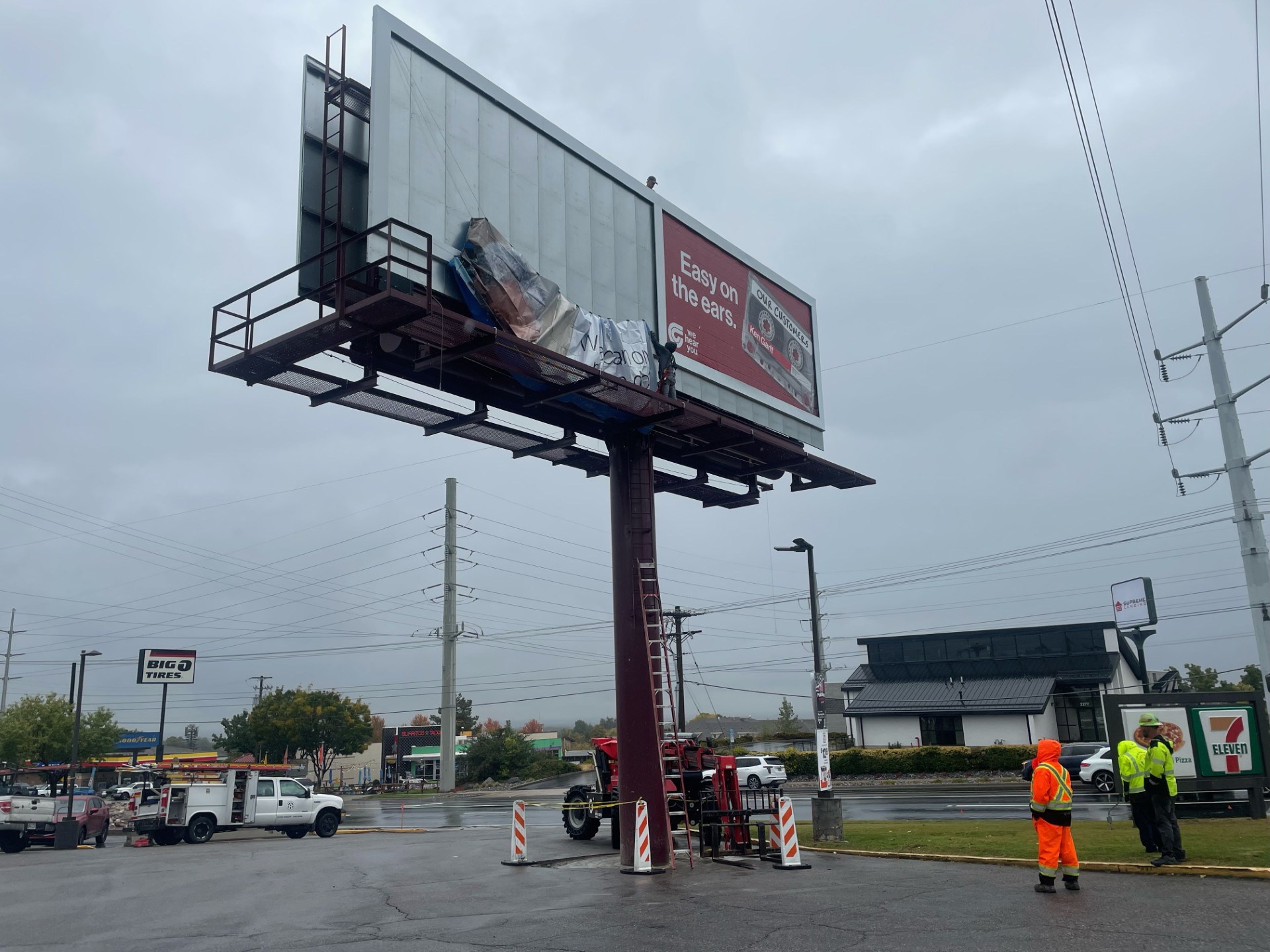 The construction of a Cottonwood Heights billboard in a convenience store parking lot on Thursday is the subject of controversy, and it's not because of what it's advertising.