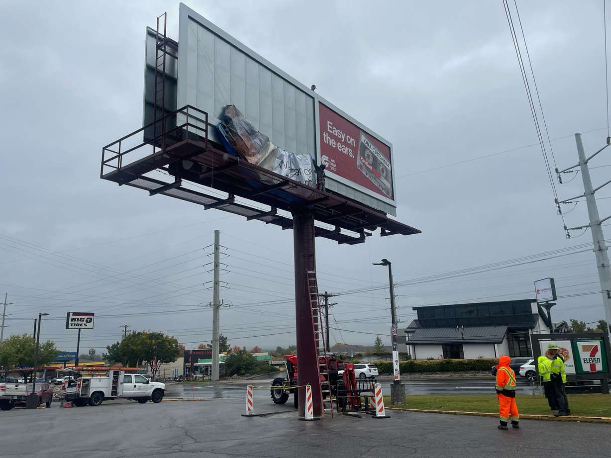 The construction of a Cottonwood Heights billboard in a convenience store parking lot on Thursday is the subject of controversy, and it's not because of what it's advertising.