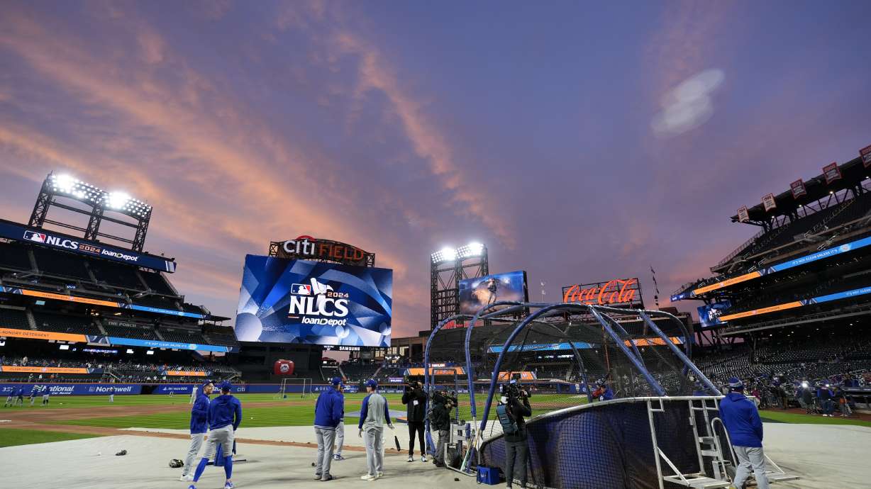 Los Angeles Dodgers take batting practice before Game 4 of a baseball NL Championship Series against the New York Mets, Thursday, Oct. 17, 2024, in New York.