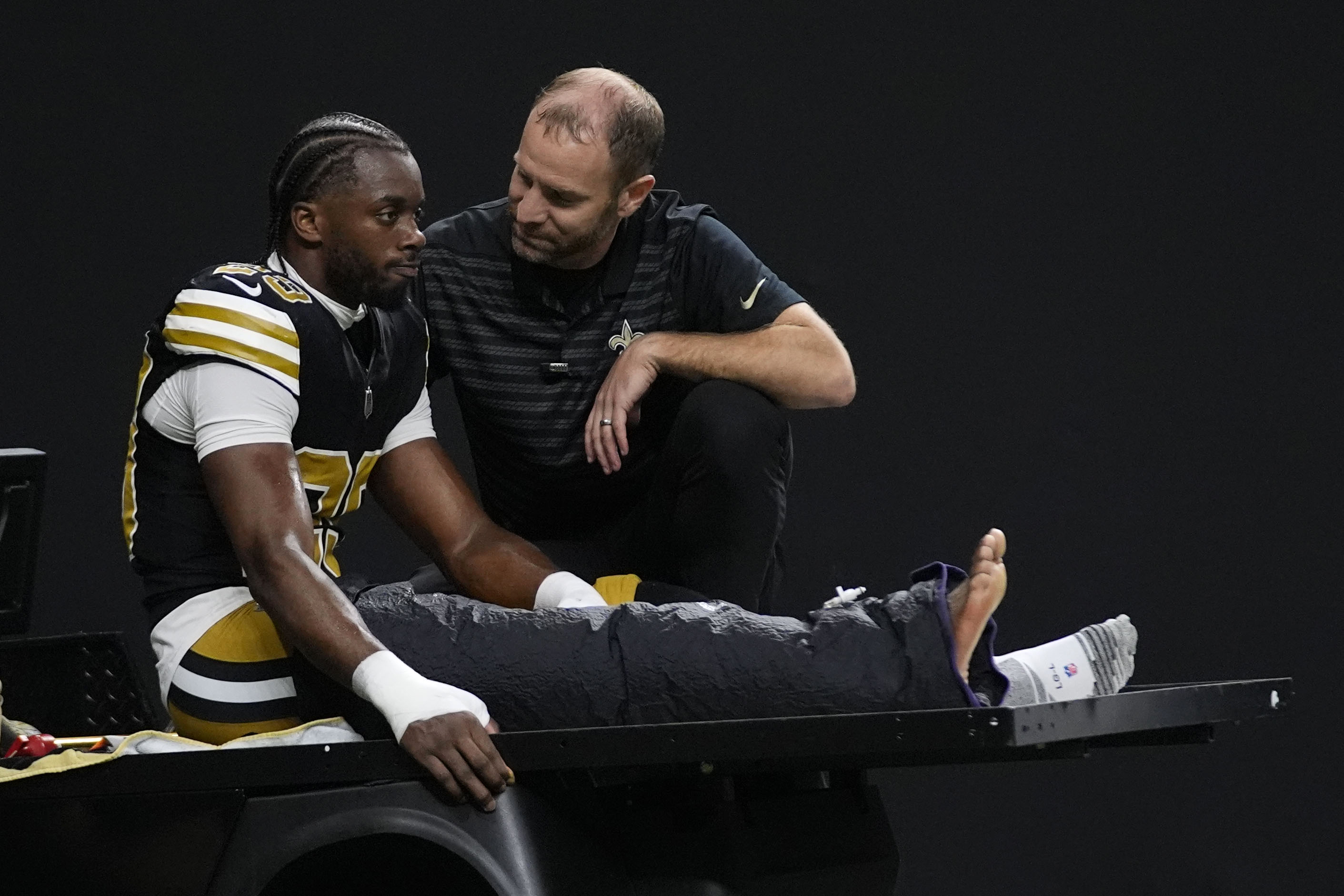 Saints cornerback Paulson Adebo carted off with leg injury vs. Broncos