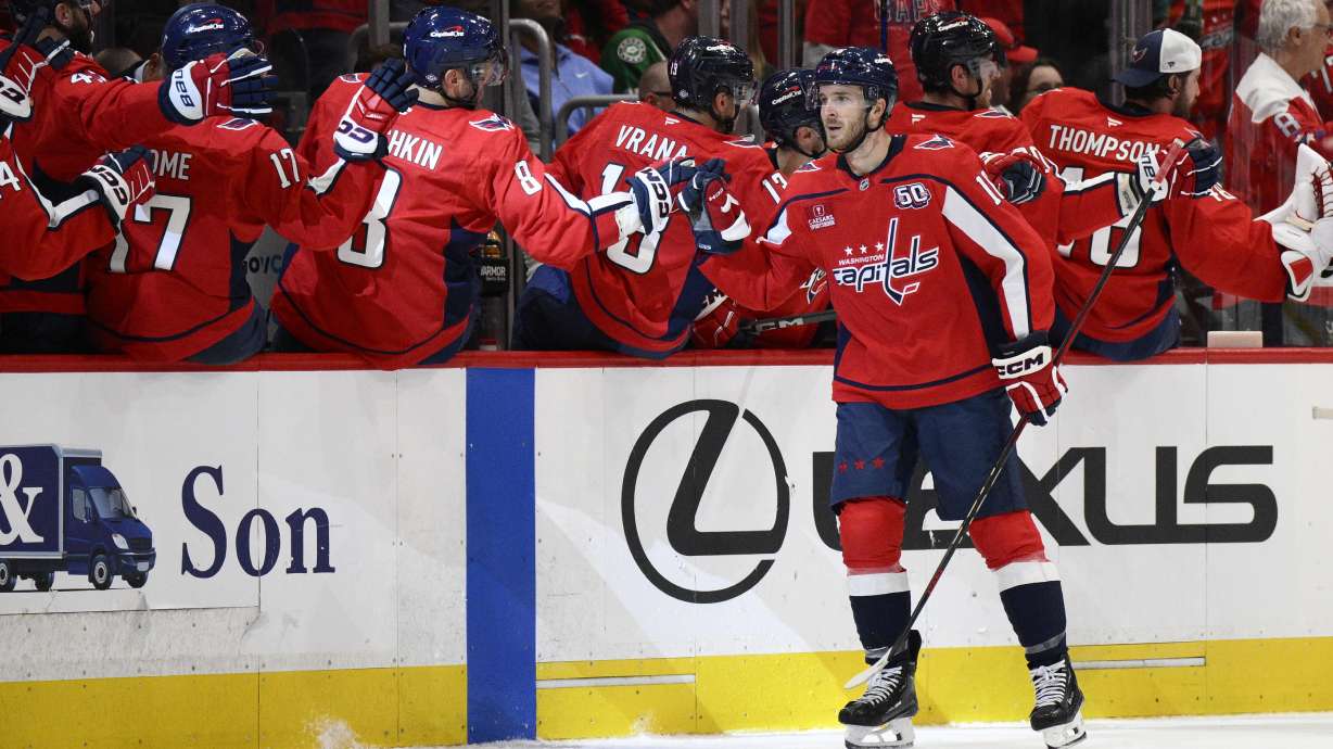 Washington Capitals right wing Taylor Raddysh celebrates his goal during the second period of an NHL hockey game against the Dallas Stars, Thursday, Oct. 17, 2024, in Washington.