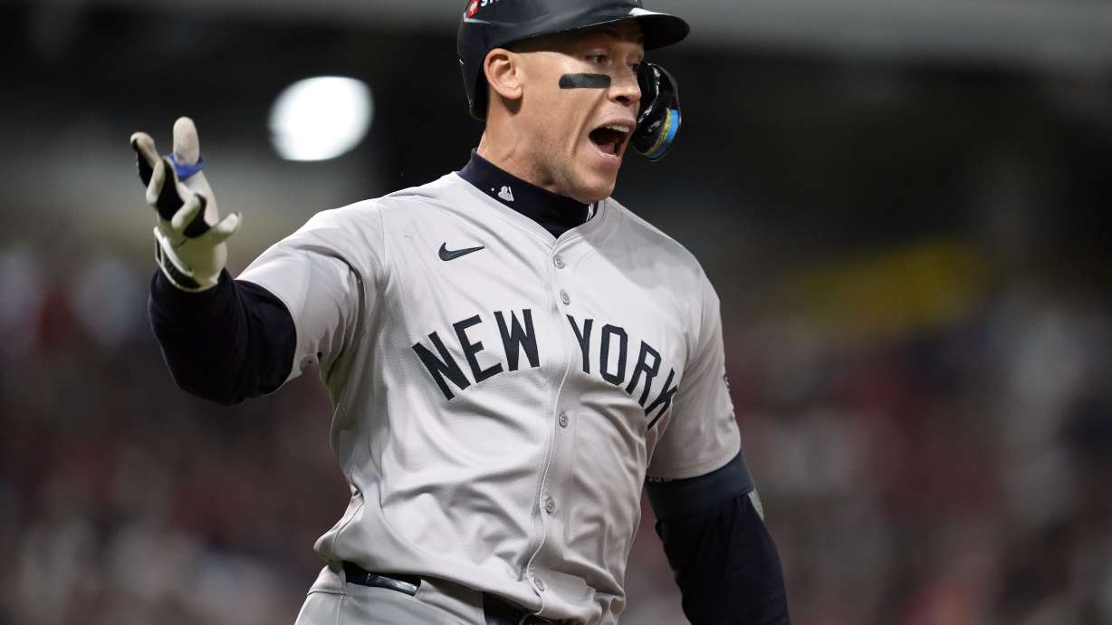 New York Yankees' Aaron Judge celebrates after hitting a two-run home run against the Cleveland Guardians during the eighth inning in Game 3 of the baseball AL Championship Series Thursday, Oct. 17, 2024, in Cleveland.