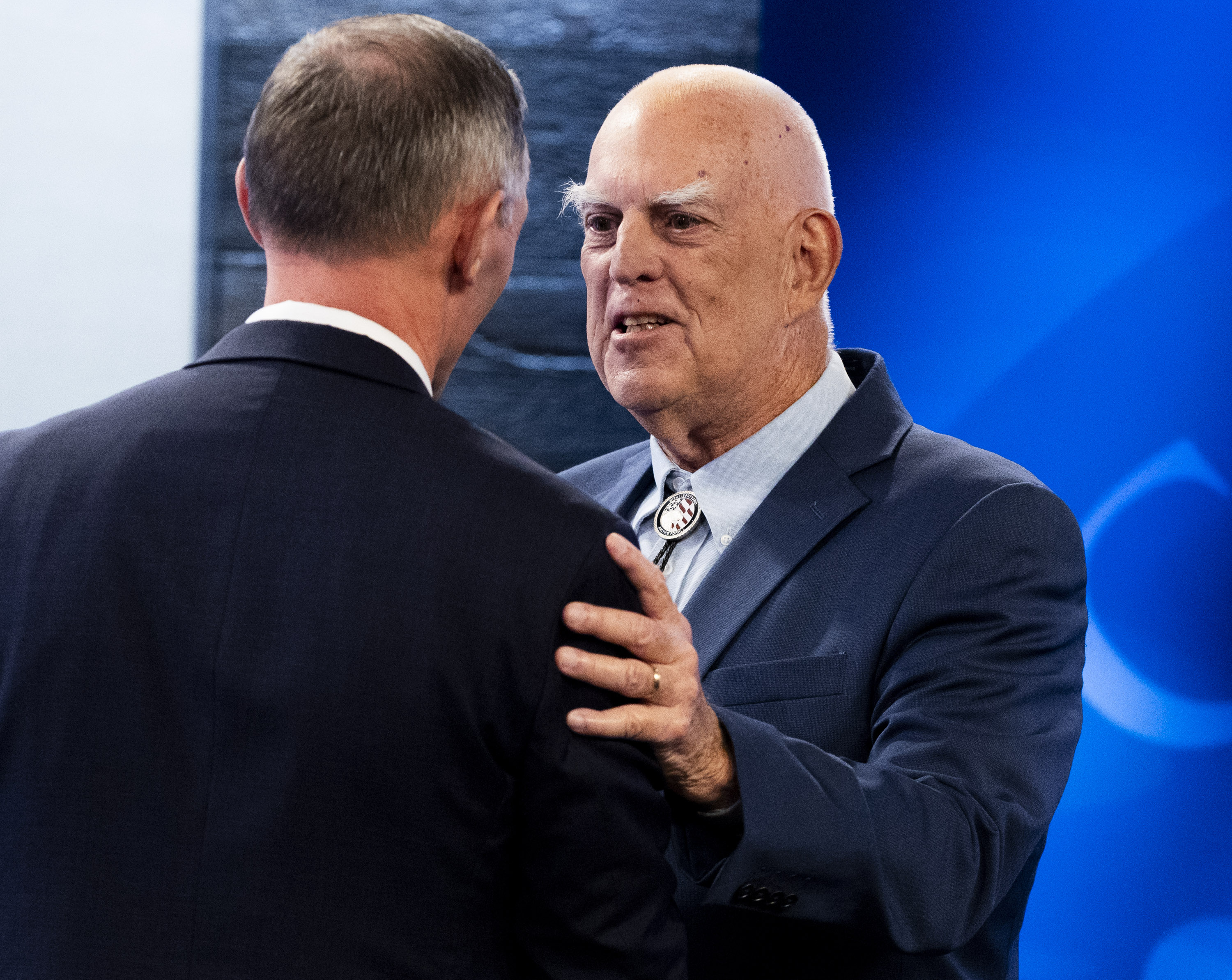 Republican state Sen. Mike Kennedy and Glenn Wright, his Democratic opponent, shake hands after the Utah Debate Commission’s debate for Congressional District 3 at the Brigham Young University Broadcasting Building in Provo on Thursday.