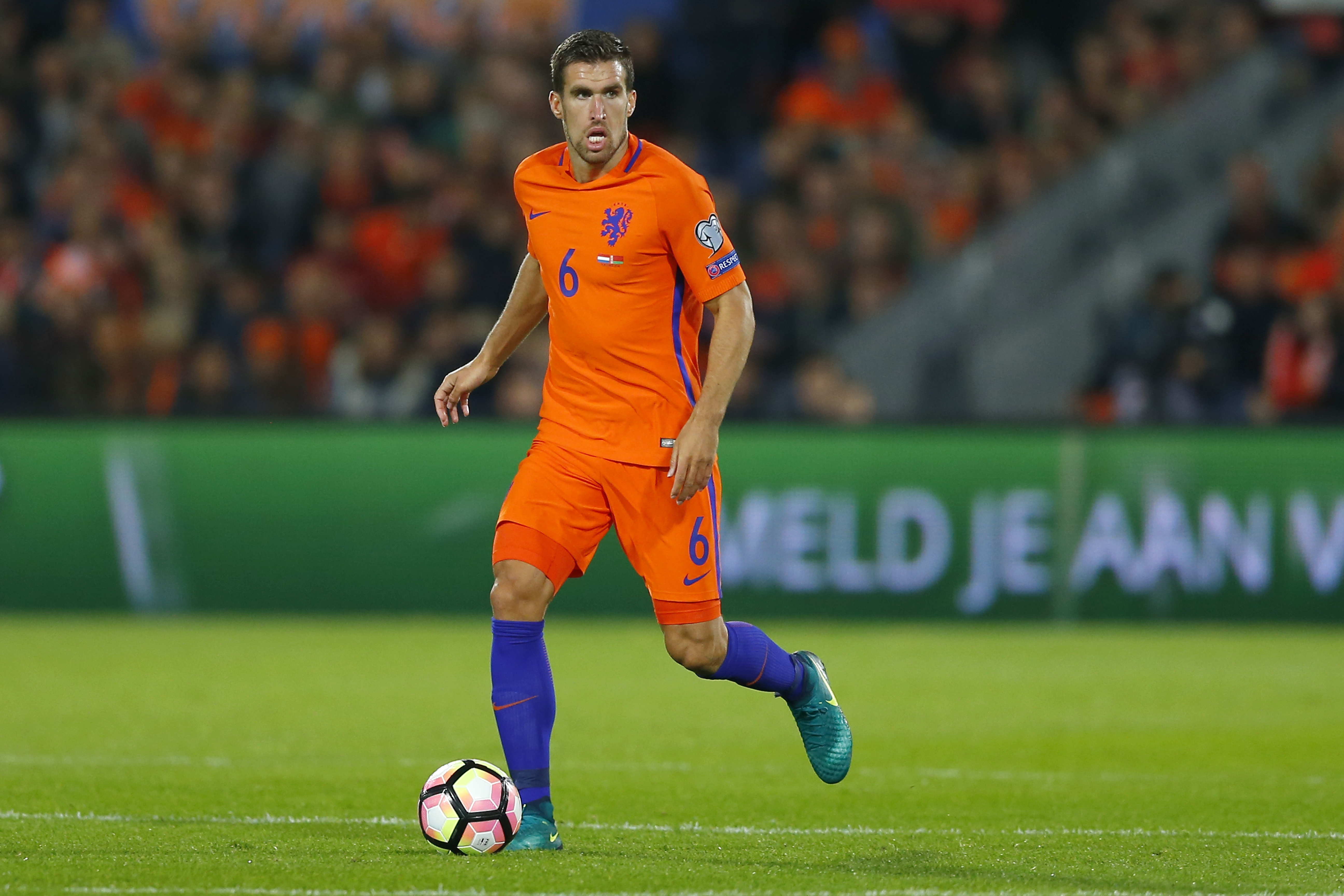FILE -Netherlands' Kevin Strootman passes the ball during the World Cup Group A qualifying soccer match in De Kuip stadium Rotterdam, Netherlands, Oct. 7, 2016.