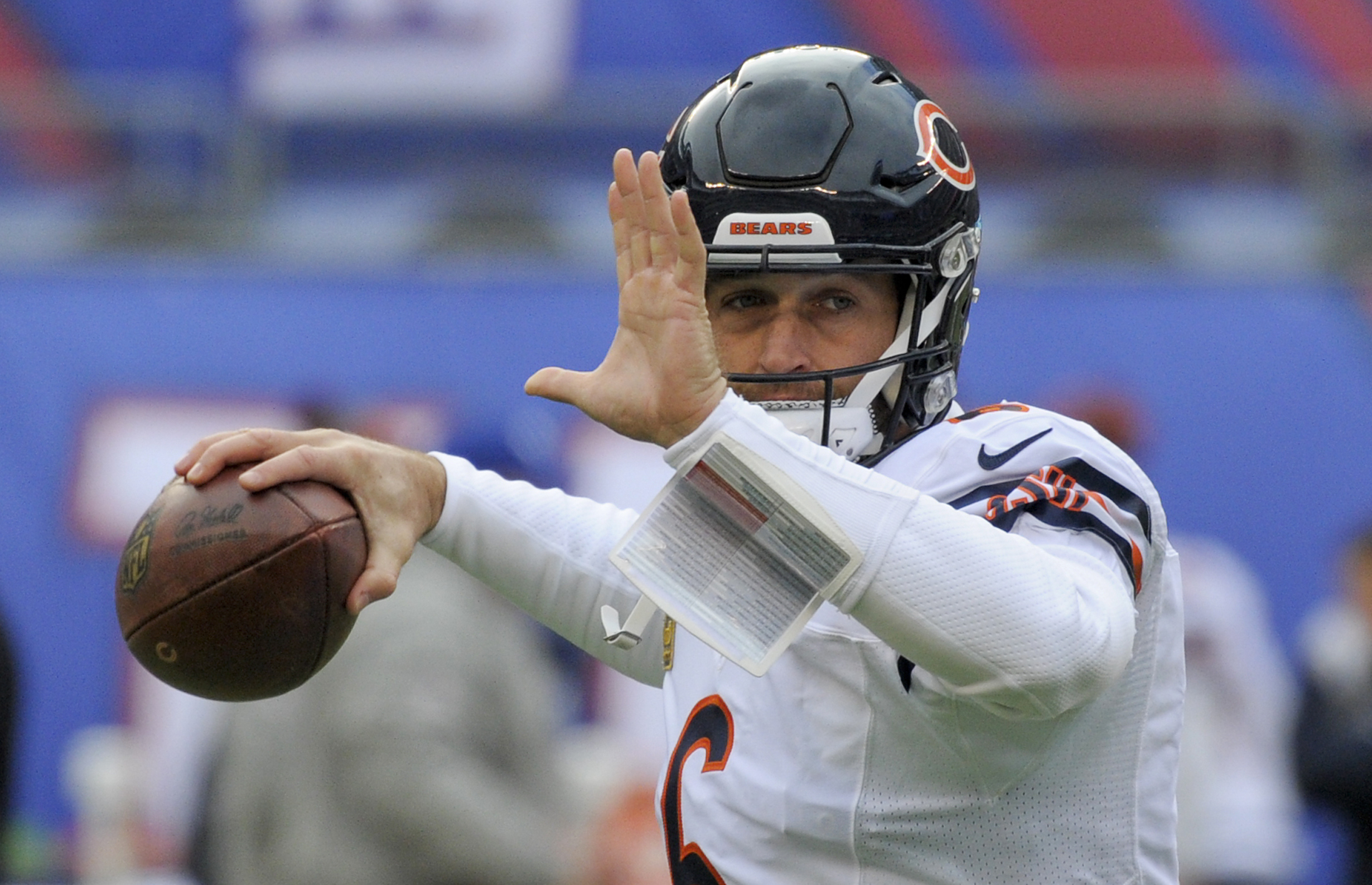 FILE - Chicago Bears quarterback Jay Cutler (6) warms up before playing against the New York Giants in an NFL football game in East Rutherford, N.J., Nov. 20, 2016. 
