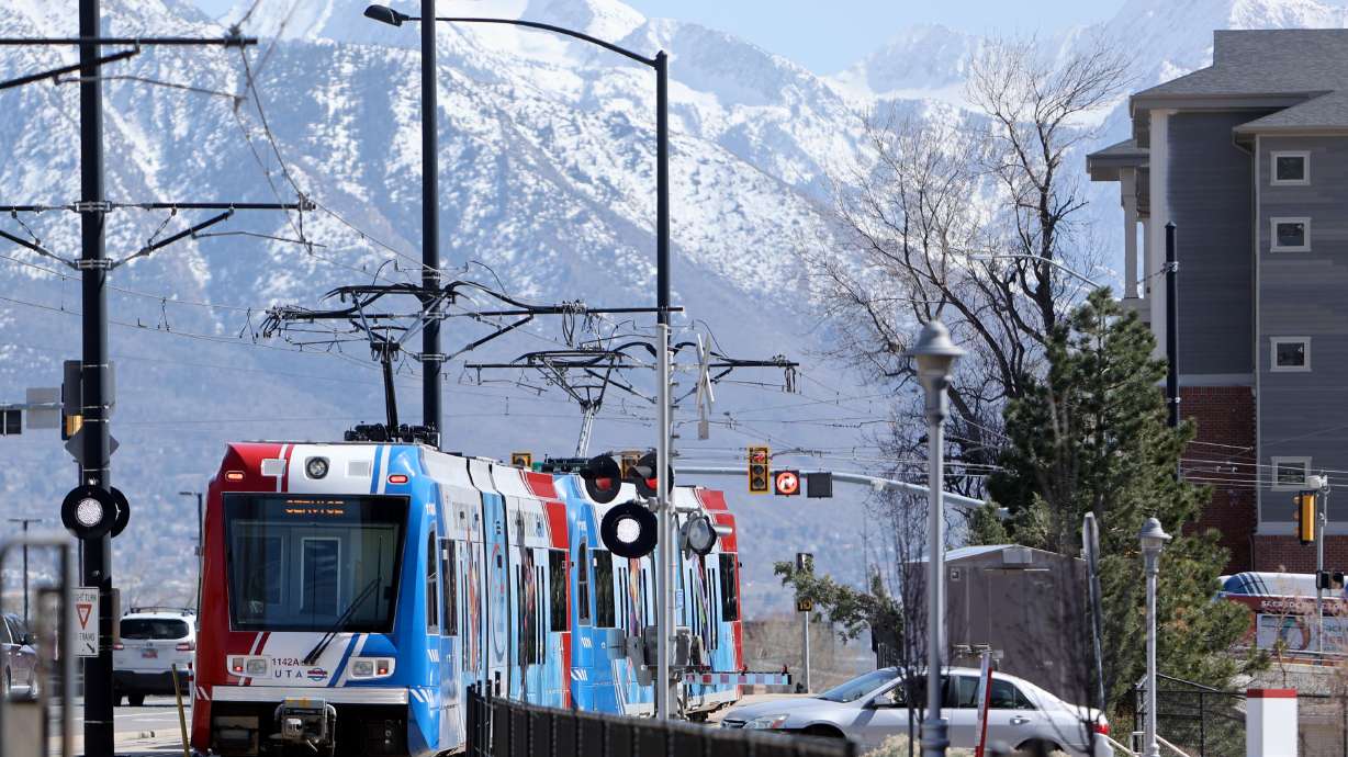 A TRAX train travels by the University of Utah campus on April 10, 2024. Red line service to the university will be restored on Sunday after a construction project closed the line for most of this summer.