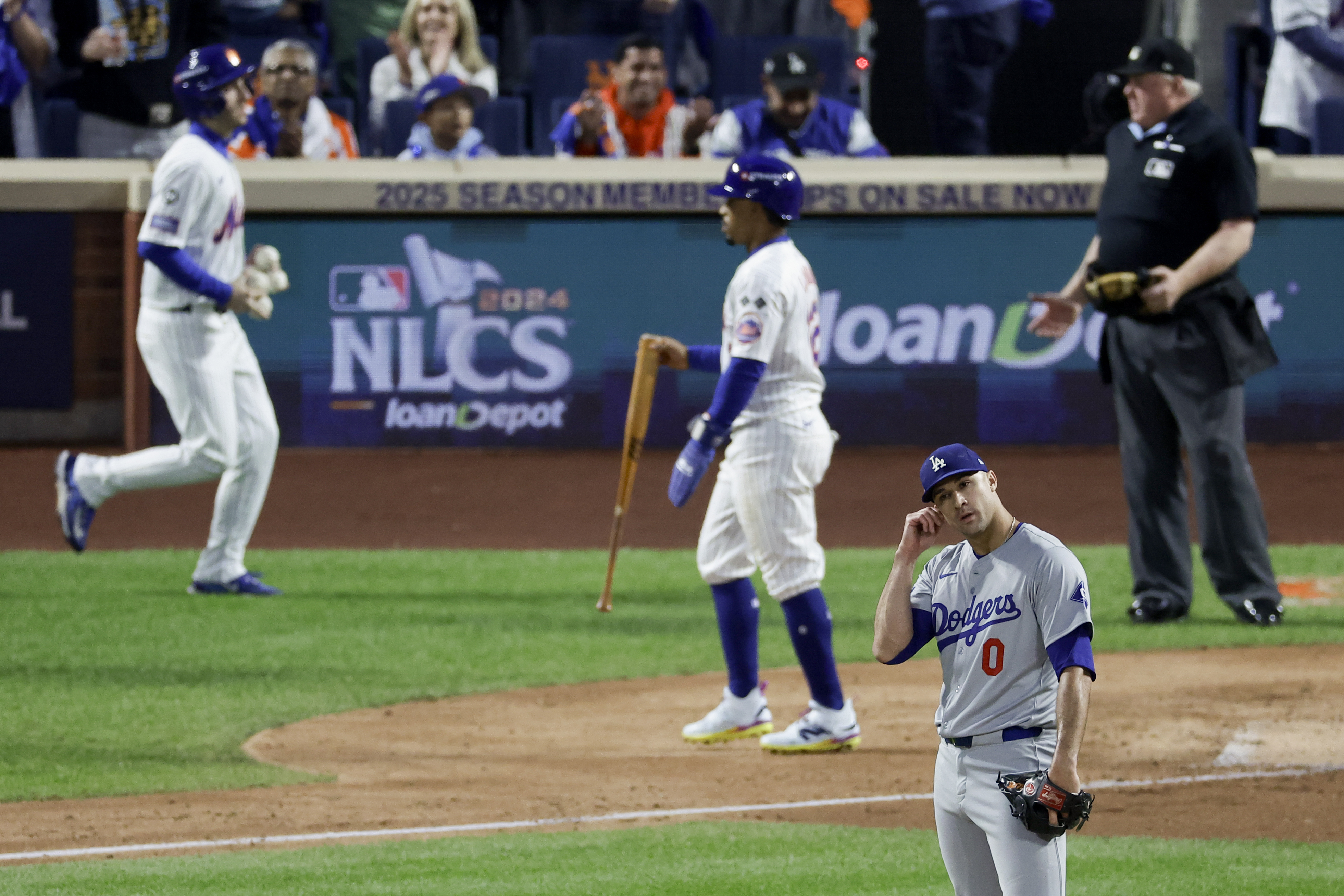 Los Angeles Dodgers pitcher Jack Flaherty reacts during the third inning in Game 5 of a baseball NL Championship Series against the New York Mets, Friday, Oct. 18, 2024, in New York. 