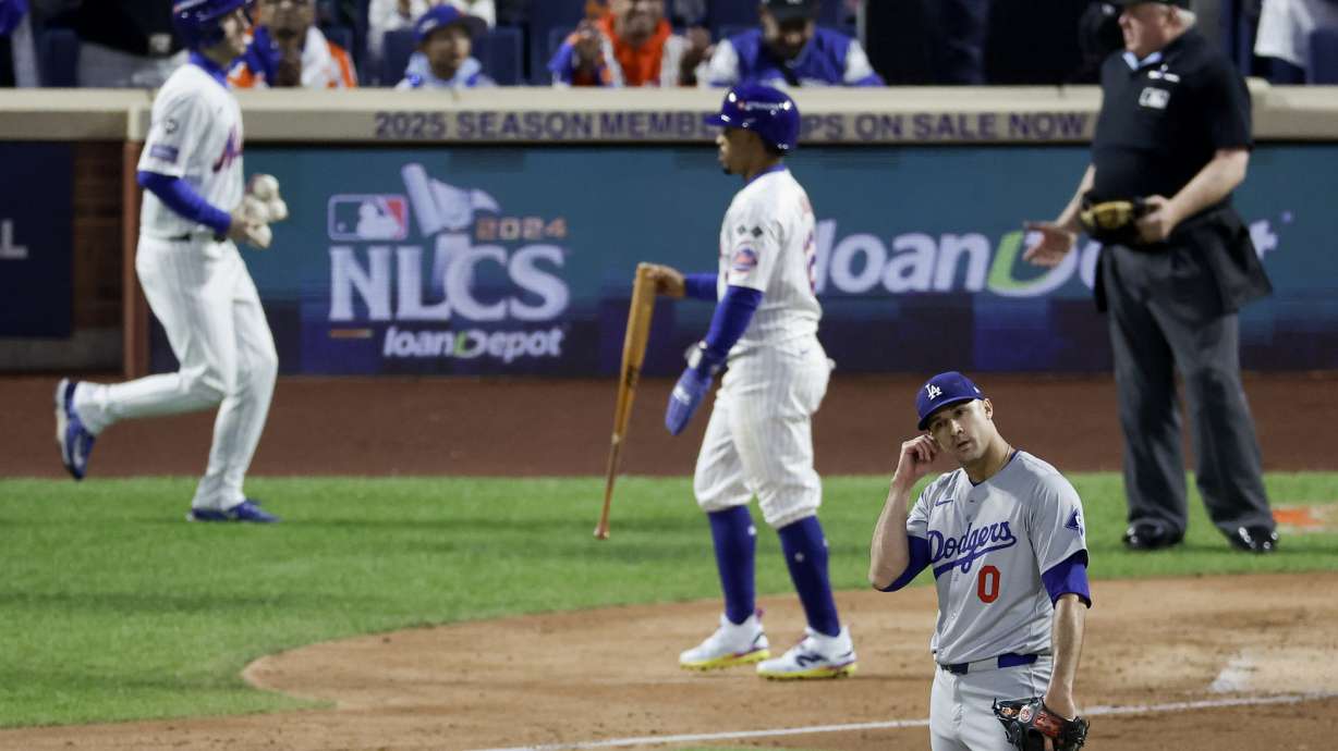 Los Angeles Dodgers pitcher Jack Flaherty reacts during the third inning in Game 5 of a baseball NL Championship Series against the New York Mets, Friday, Oct. 18, 2024, in New York.