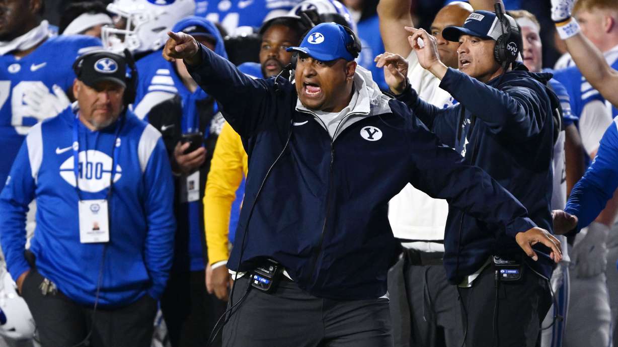 Brigham Young Cougars head coach Kalani Sitake yells out instructions as BYU and Oklahoma State play in Provo at LaVell Edwards Stadium on Friday Oct. 18, 2024. BYU won 38-35.
