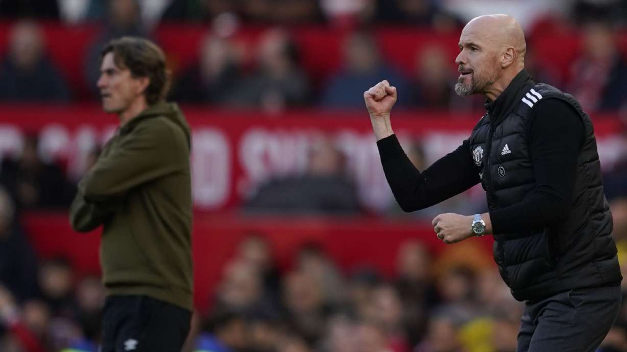 Manchester United's head coach Erik ten Hag, right, and Brentford's head coach Thomas Frank react during the English Premier League soccer match between Manchester United and Brentford at Old Trafford stadium in Manchester, England, Saturday, Oct. 19, 2024.