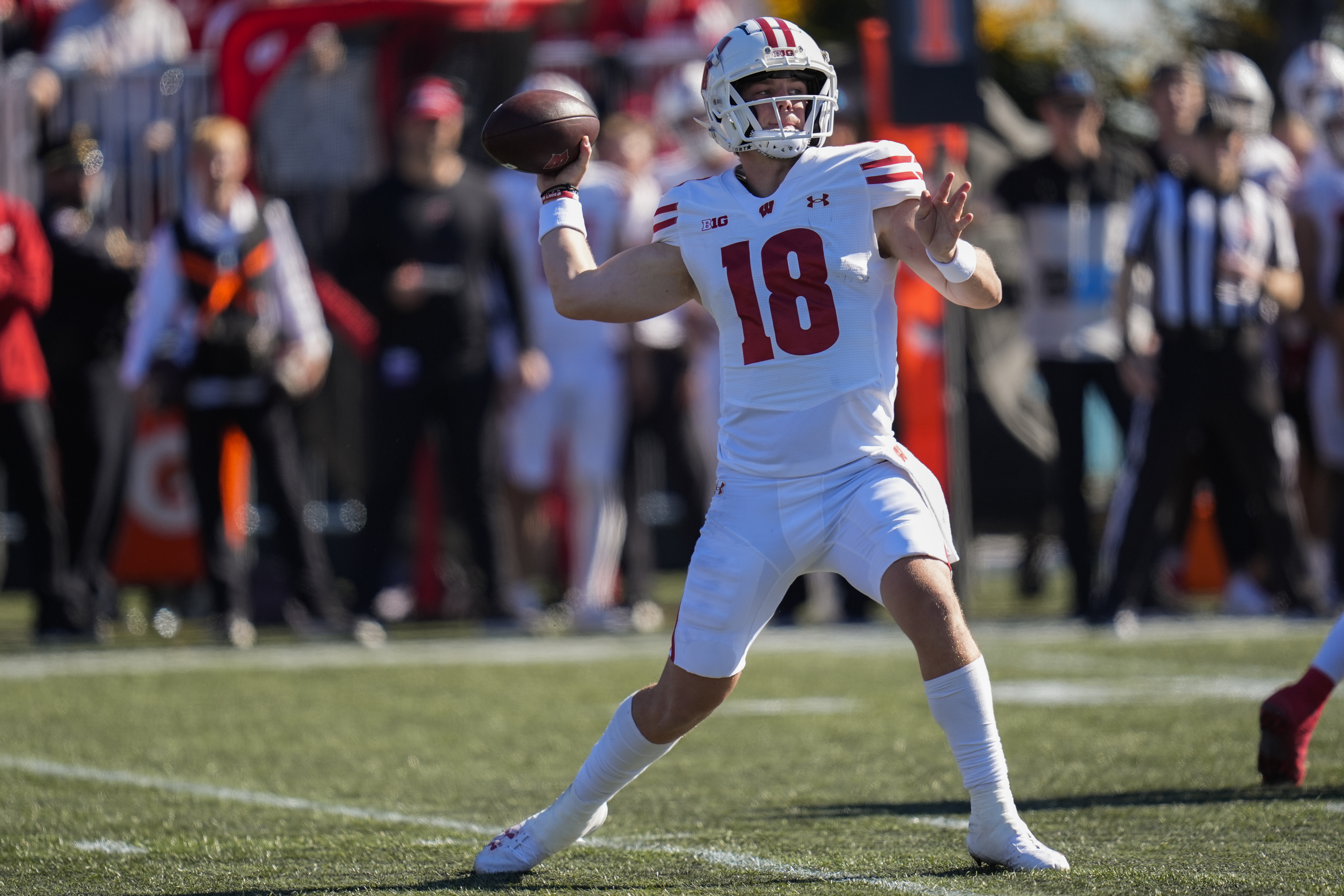 Wisconsin quarterback Braedyn Locke passes the ball during the first half of an NCAA college football game against Northwestern, Saturday, Oct. 19, 2024, in Evanston, Ill.
