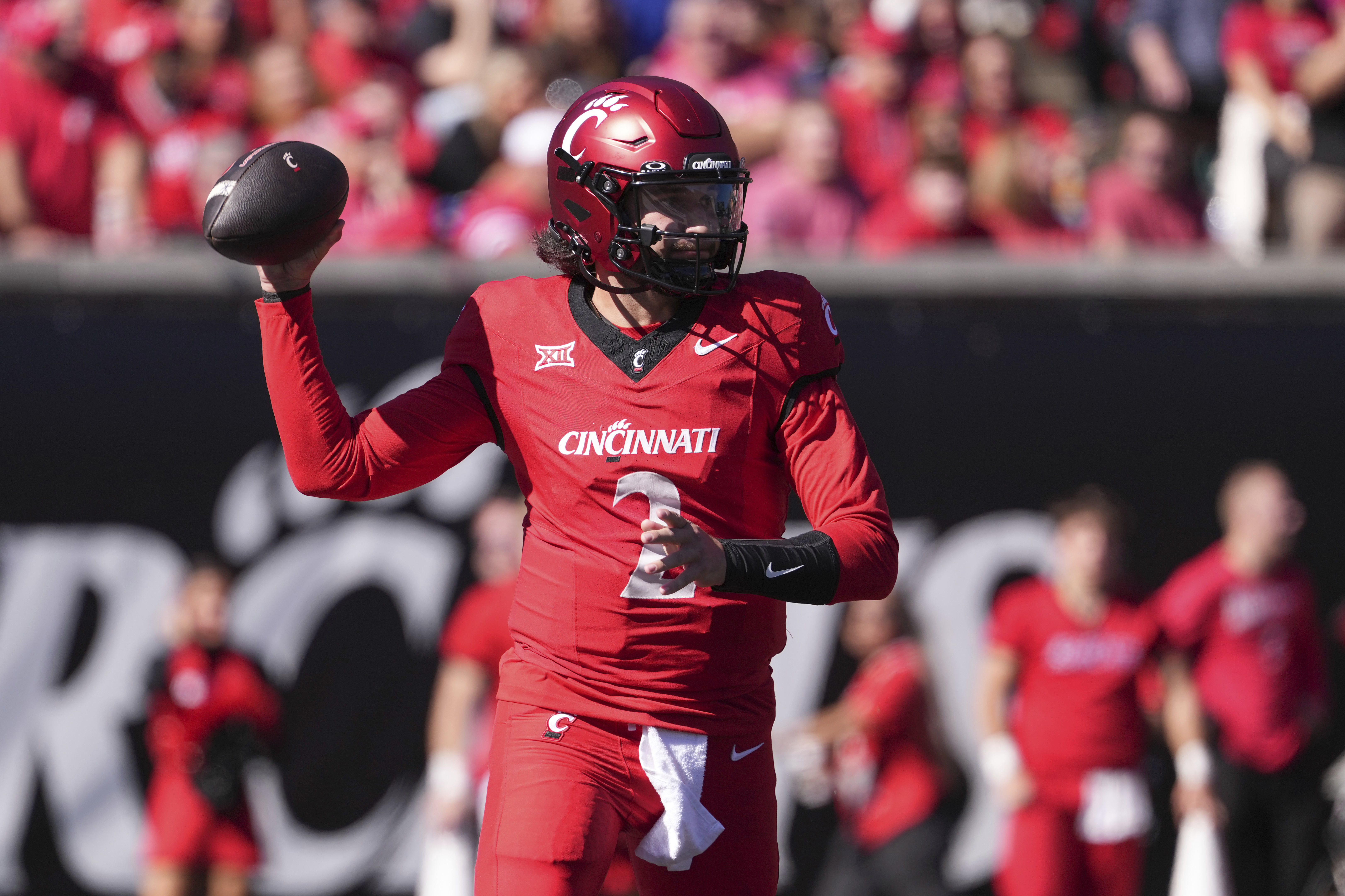 Cincinnati's Brendan Sorsby throws during the first half of an NCAA college football game against Arizona State, Saturday, Oct. 19, 2024, in Cincinnati.