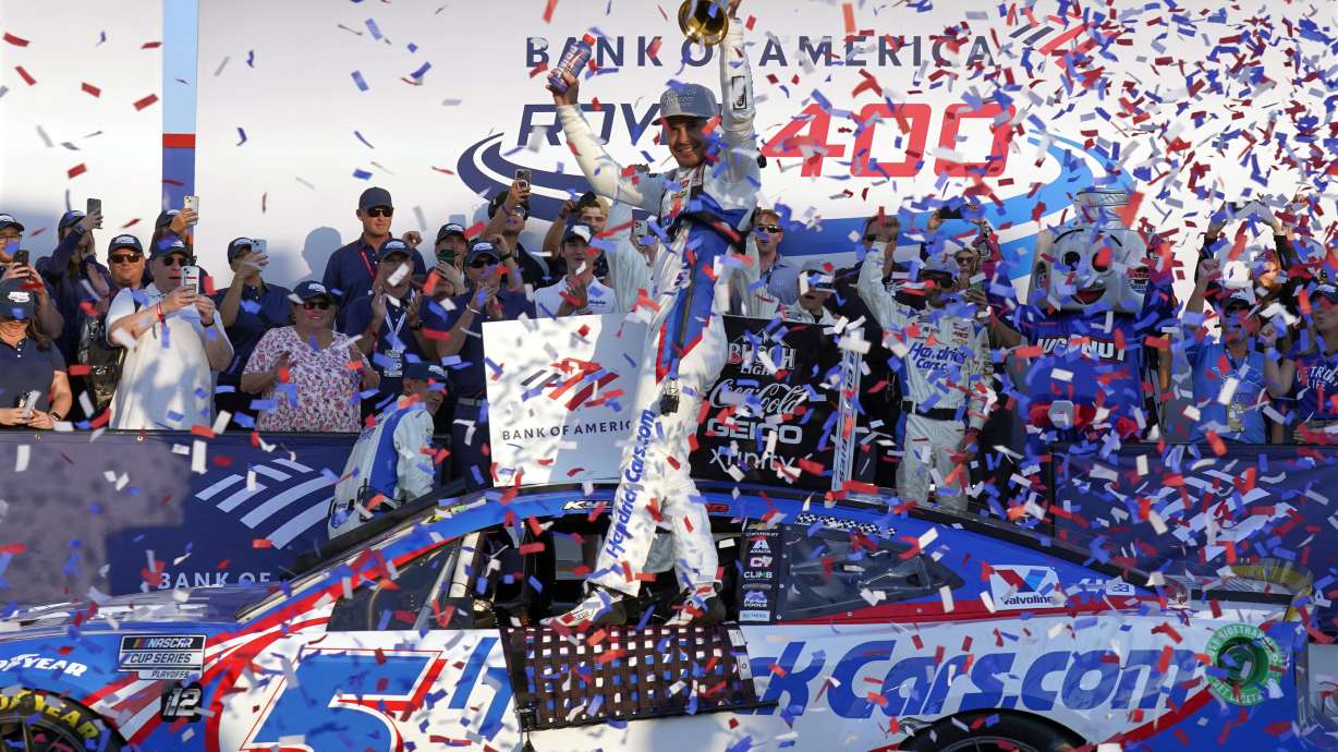 Kyle Larson, center, celebrates in Victory Lane after winning a NASCAR Cup Series auto race at Charlotte Motor Speedway in Concord, N.C., Sunday, Oct. 13, 2024.