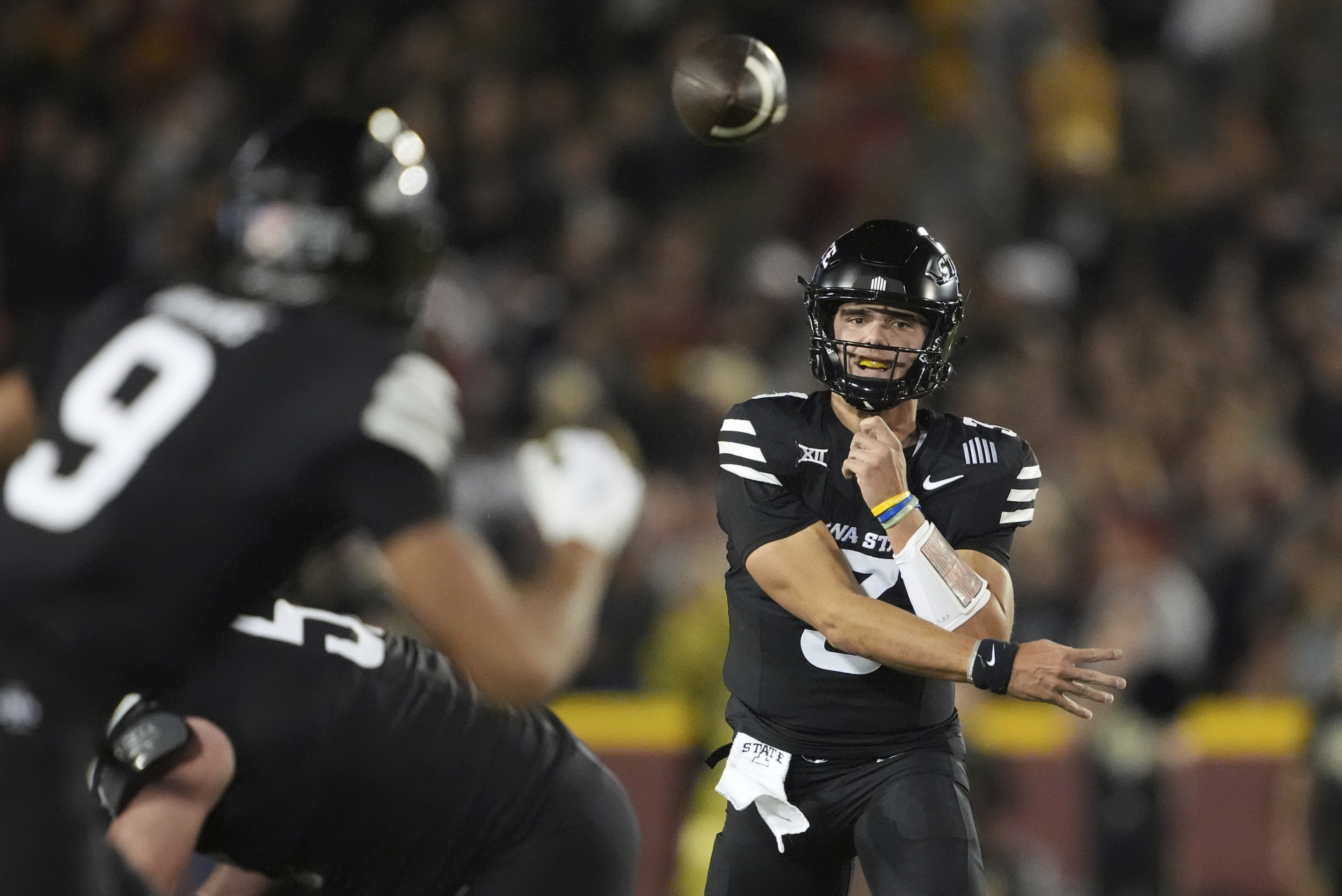 Iowa State quarterback Rocco Becht sends the ball downfield to a receiver during the first half of an NCAA college football game against Central Florida, Saturday, Oct. 19, 2024, in Ames, Iowa. 