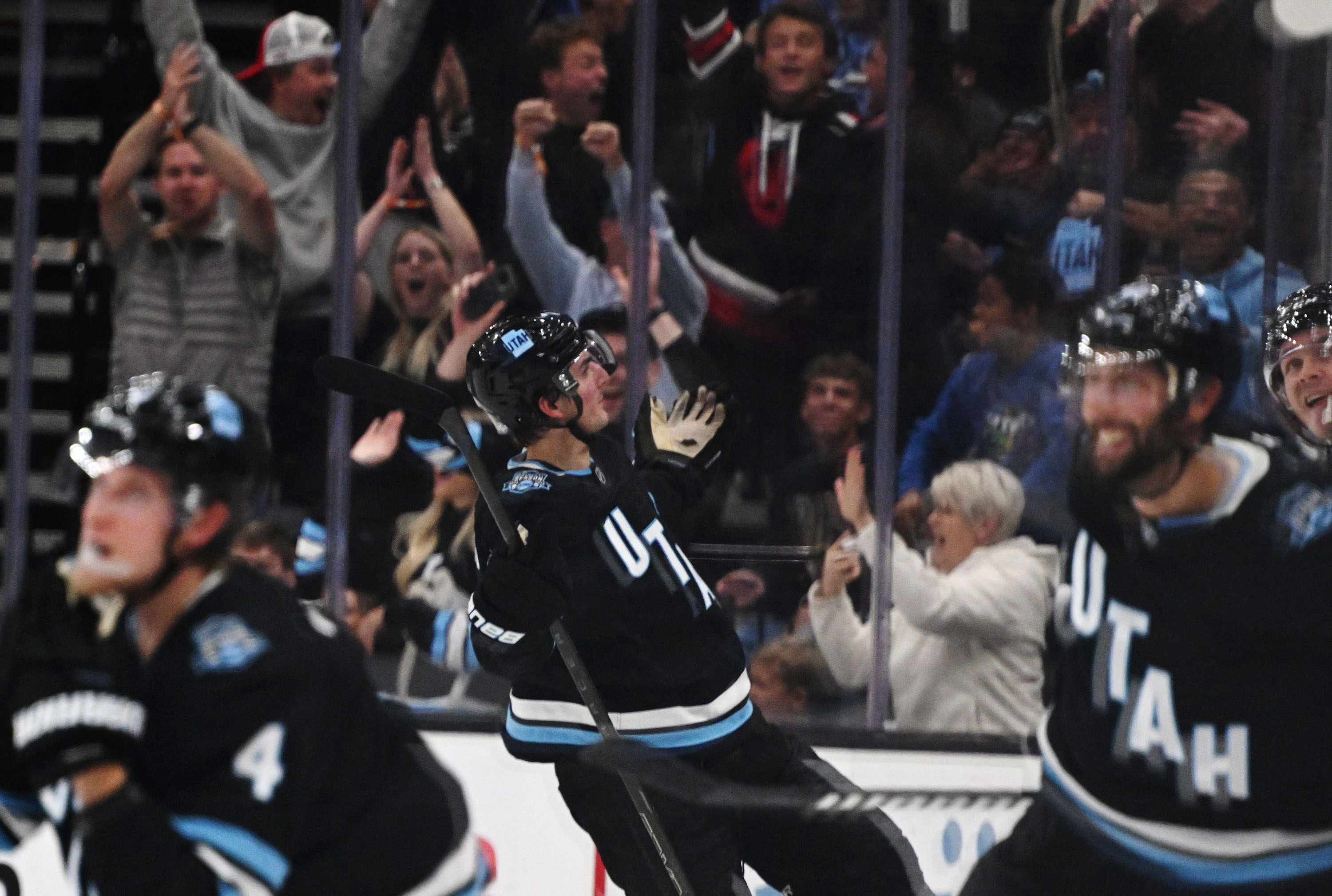 Utah Hockey Club defenseman Michael Kesselring (7) celebrates after scoring the game winning goal against the Boston Bruins at the Delta Center in Salt Lake City on Saturday Oct. 19, 2024. Utah won 2-1 in overtime.