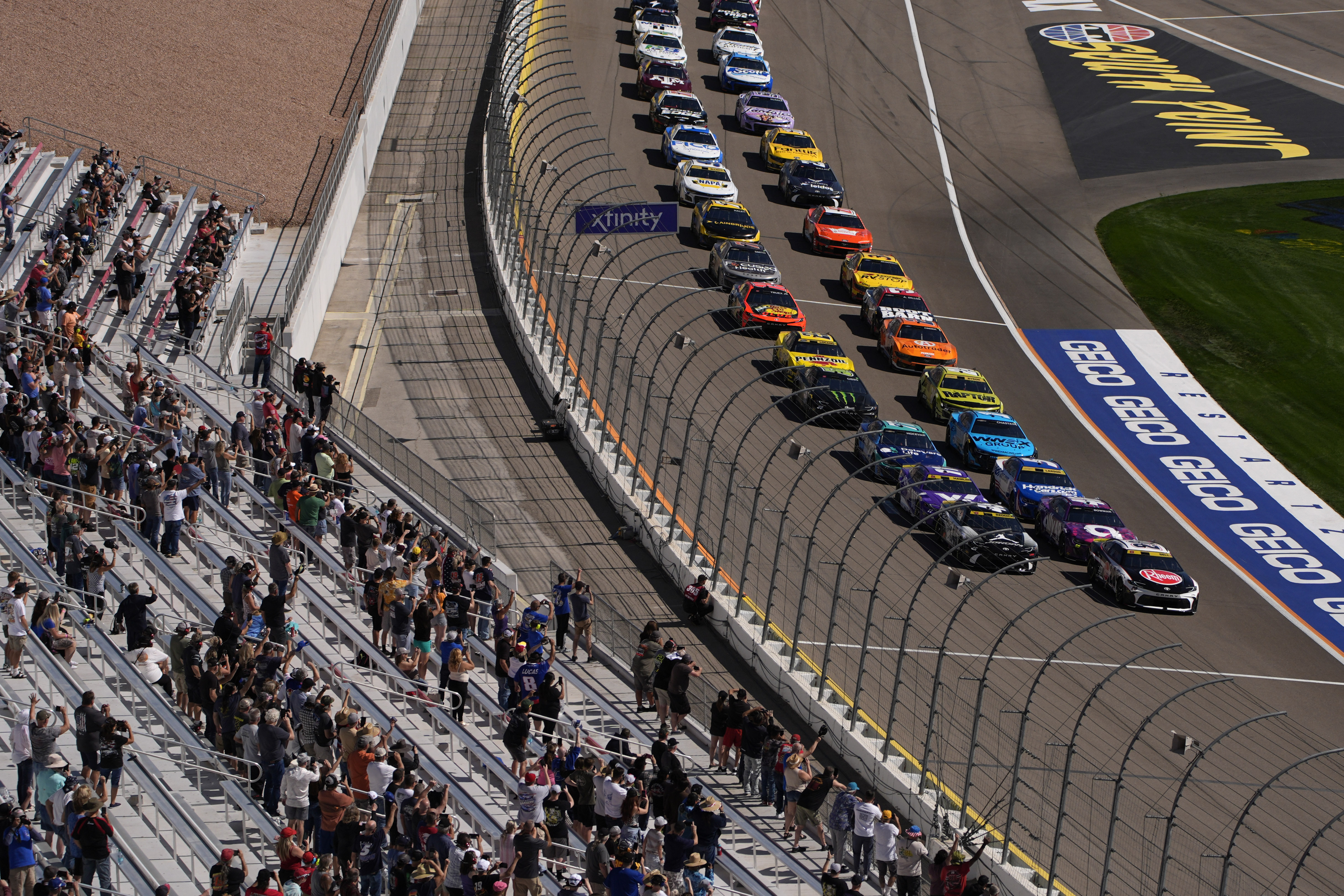 Cars begin a NASCAR Cup Series auto race Sunday, Oct. 20, 2024, in Las Vegas.