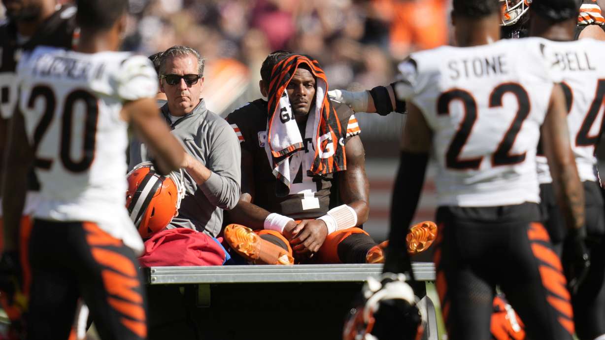 Cleveland Browns quarterback Deshaun Watson (4) is carted off the field after being injured in the first half of an NFL football game against the Cincinnati Bengals, Sunday, Oct. 20, 2024, in Cleveland.