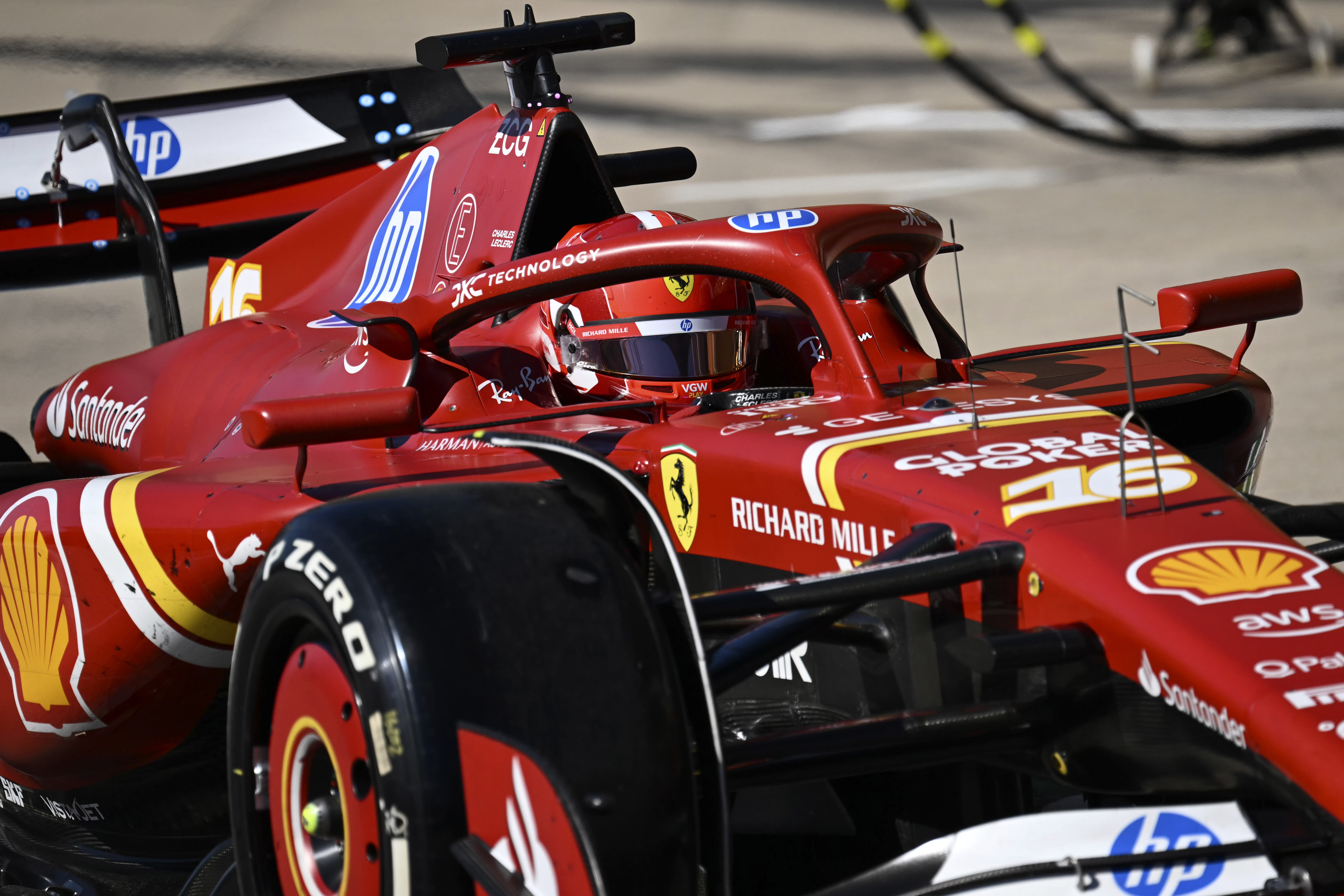 Ferrari driver Charles Leclerc, of Monaco, exits pit row during the F1 U.S. Grand Prix auto race at the Circuit of the Americas, Sunday, Oct. 20, 2024, in Austin, Texas.