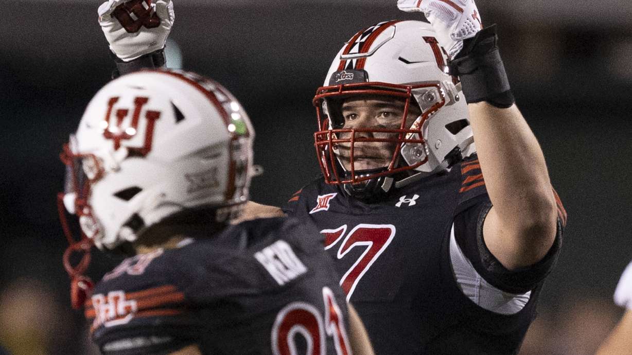 Utah Utes defensive tackle Keanu Tanuvasa (57) waves for fans to get louder during a game between the University of Utah and the TCU Horned Frogs at Rice-Eccles Stadium in Salt Lake City on Saturday, Oct. 19, 2024. The TCU Horned Frogs defeated the Utah Utes 13-7.