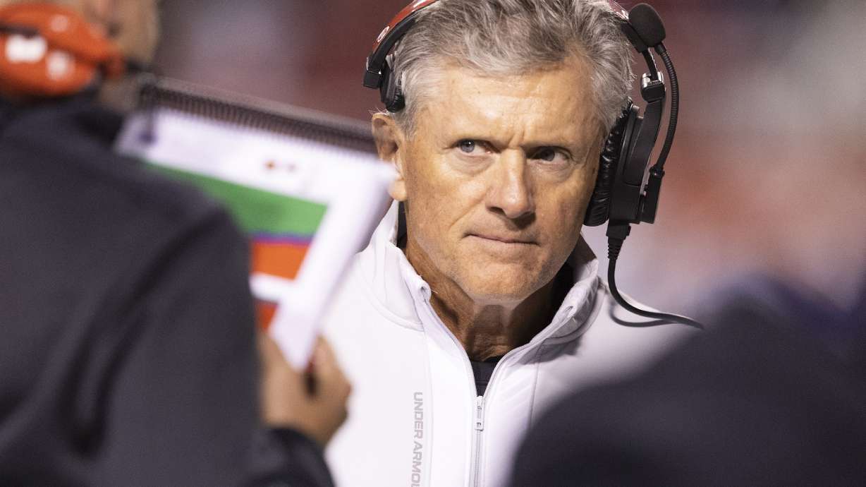 Utah Utes head coach Kyle Whittingham talks to another coach during a game between the University of Utah and the TCU Horned Frogs at Rice-Eccles Stadium in Salt Lake City on Saturday, Oct. 19, 2024. The TCU Horned Frogs defeated the Utah Utes 13-7.