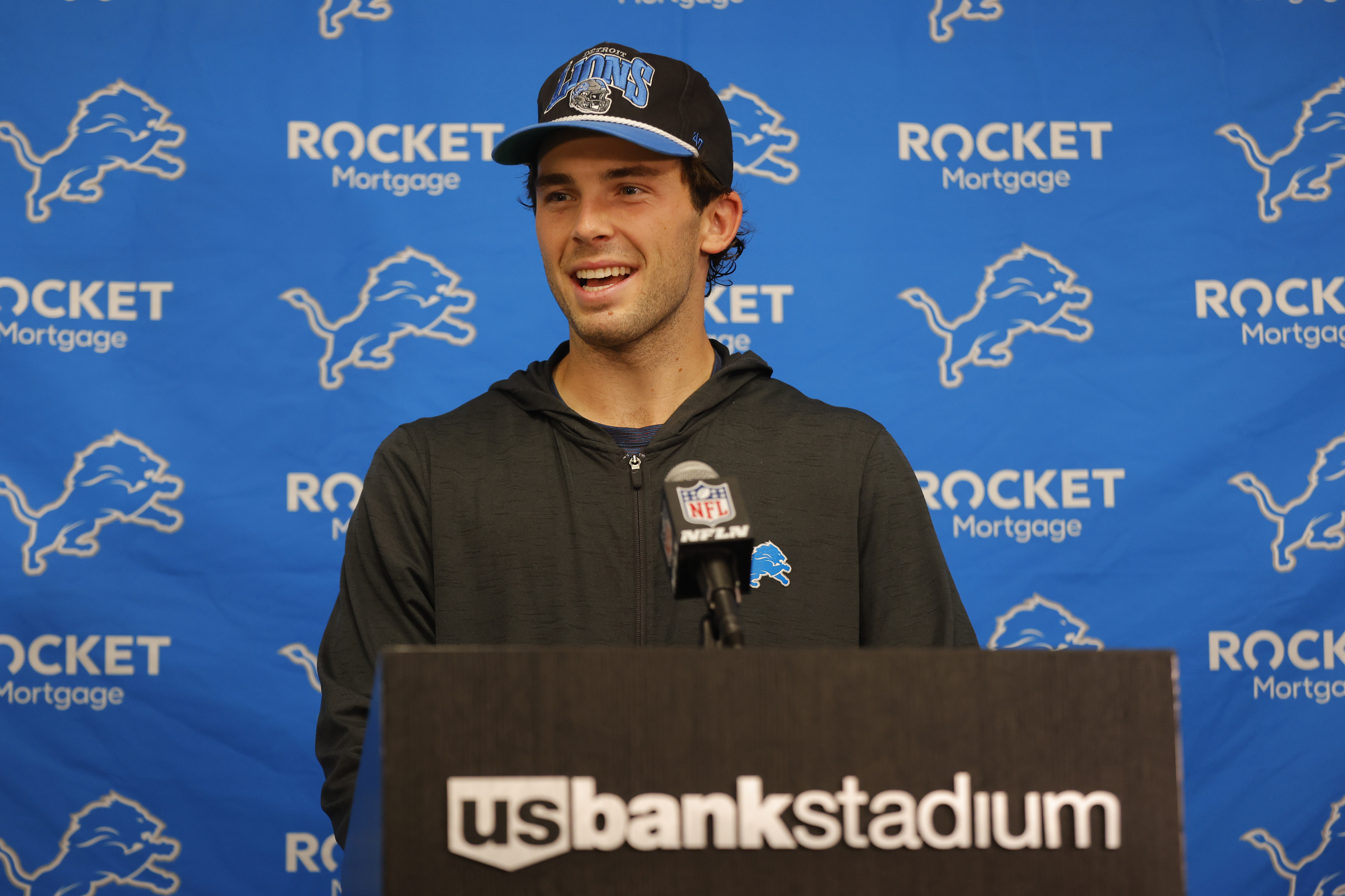 Detroit Lions place kicker Jake Bates speaks to the media after an NFL football game against the Minnesota Vikings, Sunday, Oct. 20, 2024, in Minneapolis.