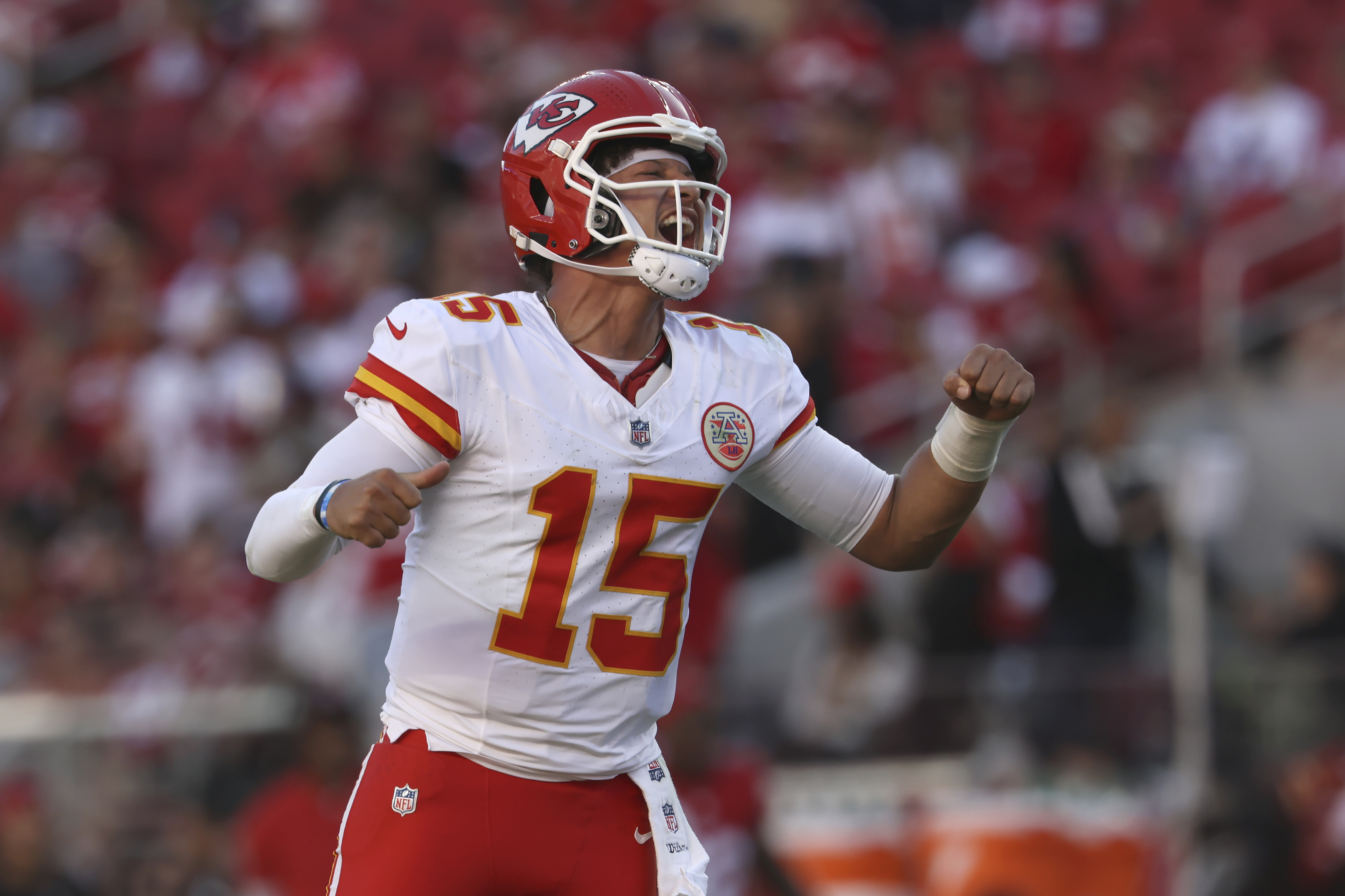Kansas City Chiefs quarterback Patrick Mahomes (15) celebrates after a touchdown by Mecole Hardman during the second half of an NFL football game against the San Francisco 49ers in Santa Clara, Calif., Sunday, Oct. 20, 2024. 