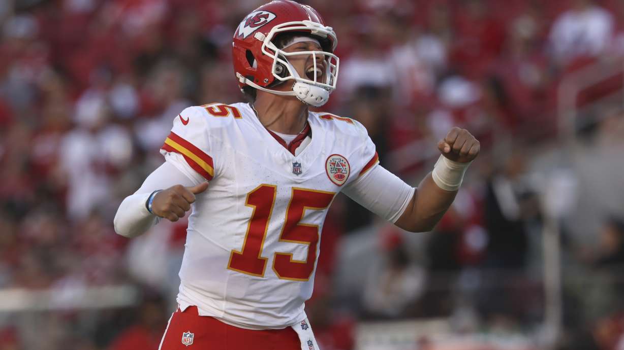 Kansas City Chiefs quarterback Patrick Mahomes (15) celebrates after a touchdown by Mecole Hardman during the second half of an NFL football game against the San Francisco 49ers in Santa Clara, Calif., Sunday, Oct. 20, 2024.