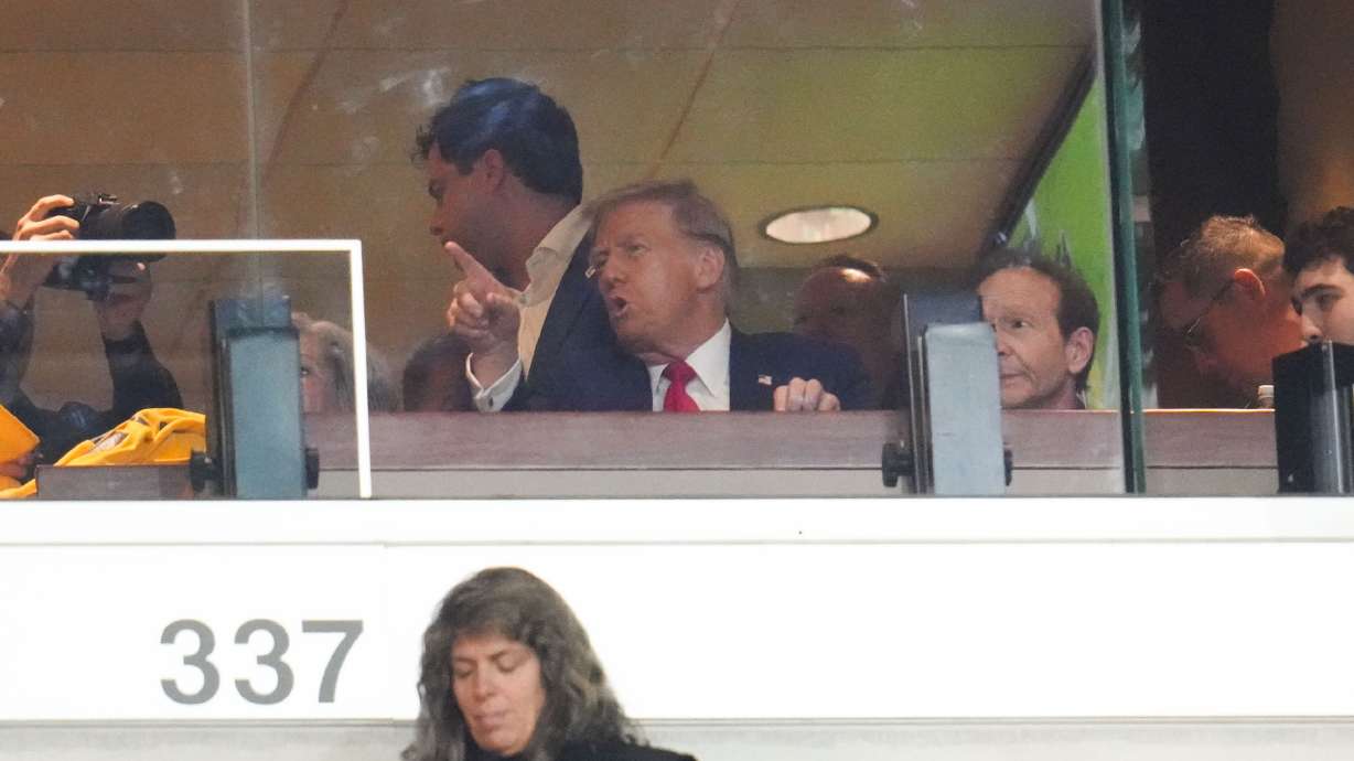 Republican presidential nominee former President Donald Trump watches the first half of an NFL football game between the Pittsburgh Steelers and the New York Jets in Pittsburgh, Sunday, Oct. 20, 2024.
