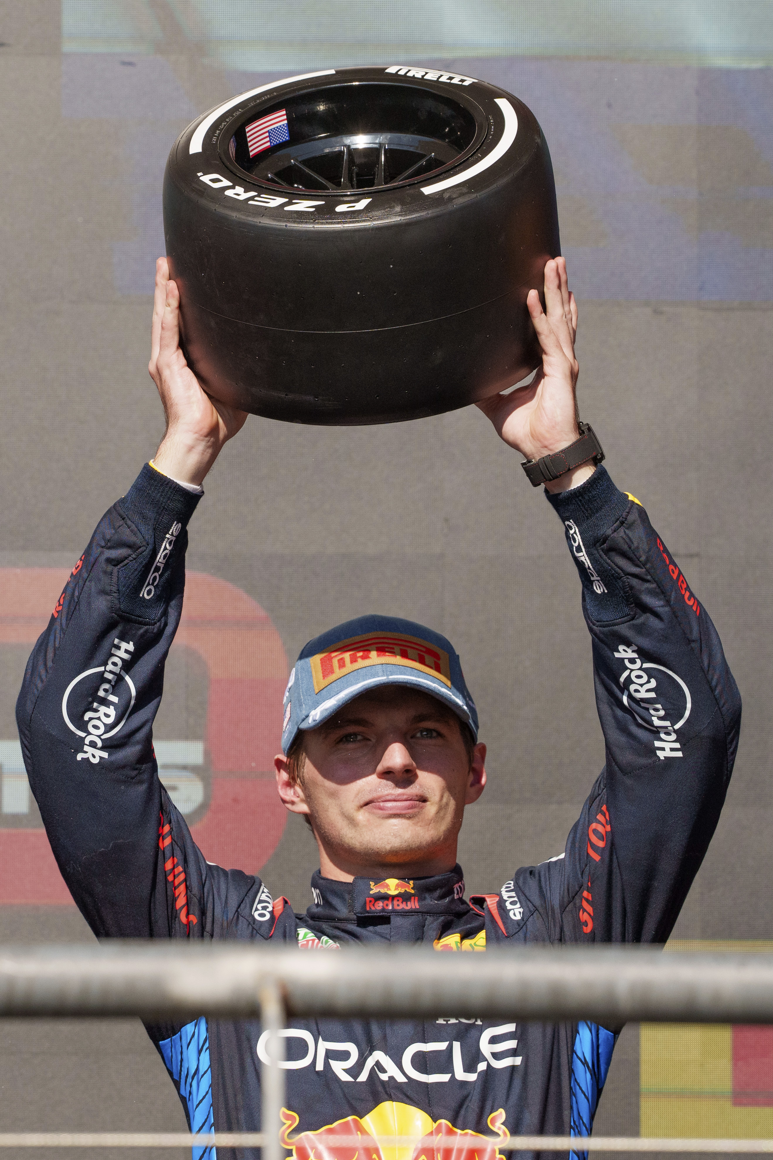 Red Bull driver Max Verstappen, of the Netherlands, holds up his third place trophy after the Formula One U.S. Grand Prix auto race at Circuit of the Americas, Sunday, Oct. 20, 2024, in Austin, Texas.