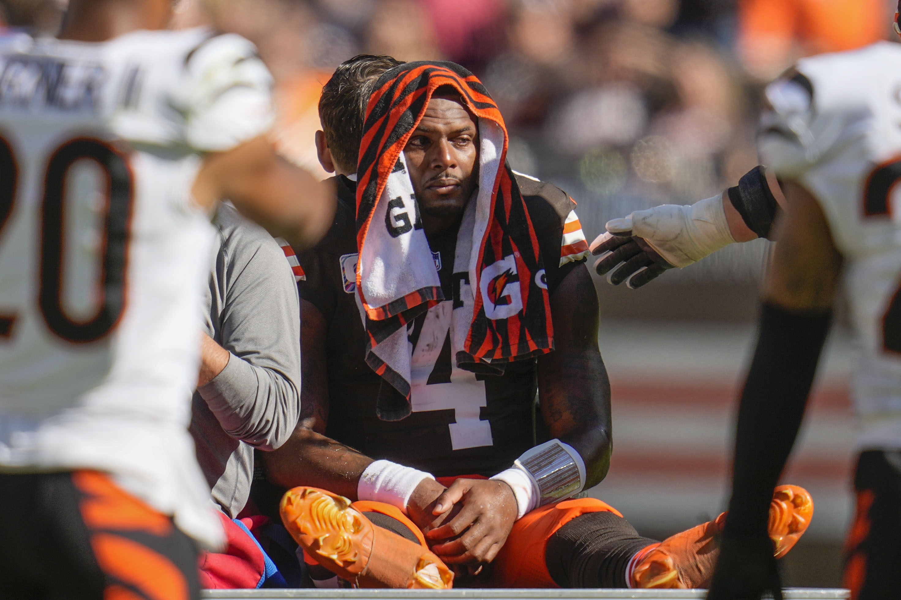 Cleveland Browns quarterback Deshaun Watson (4) is carted off the field after being injured in the first half of an NFL football game against the Cincinnati Bengals, Sunday, Oct. 20, 2024, in Cleveland.