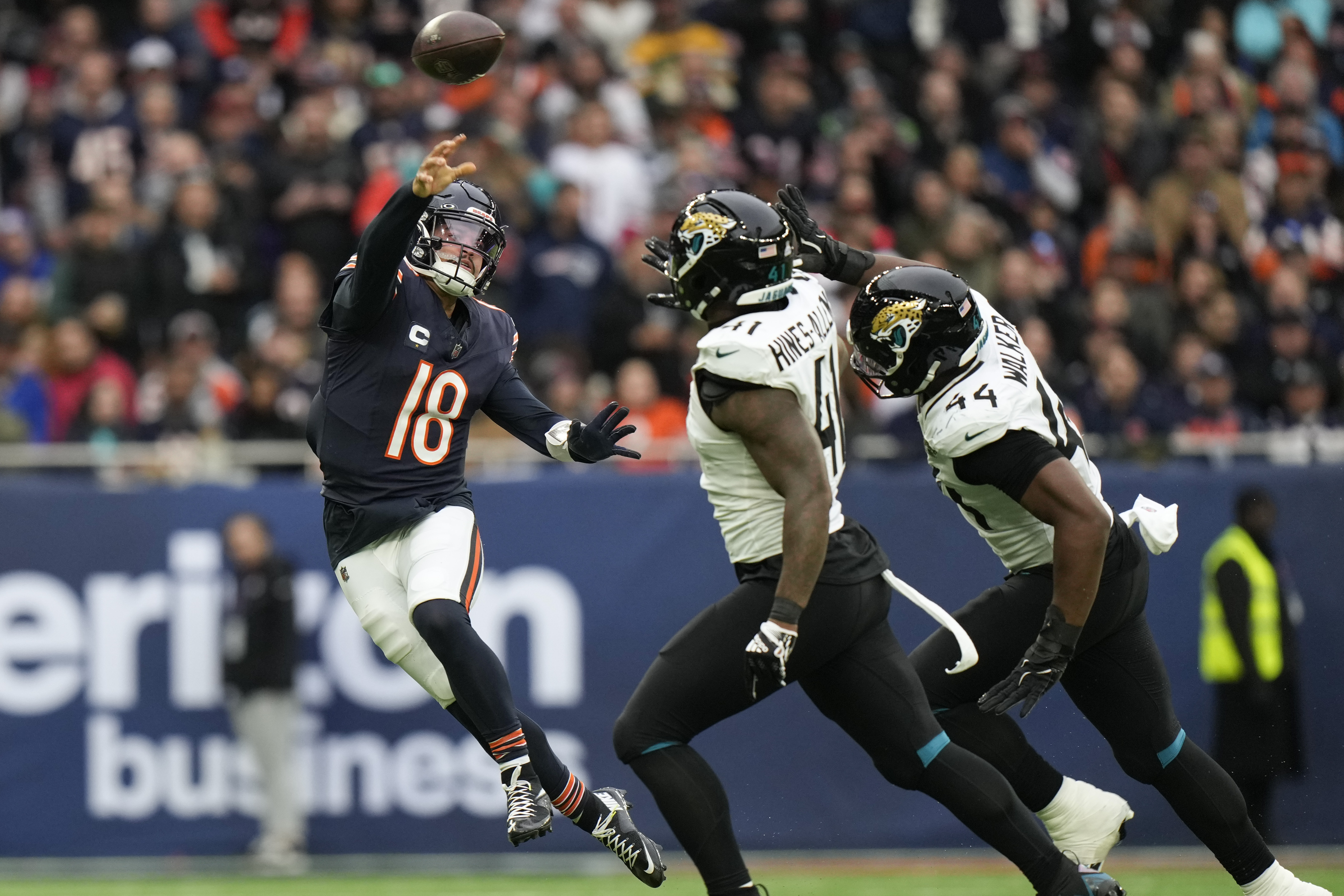 Chicago Bears quarterback Caleb Williams (18) passes the ball during an NFL football game at the Tottenham Hotspur stadium between the Jacksonville Jaguars and Chicago Bears in London, Sunday, Oct. 13, 2024.