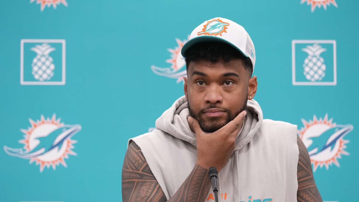 Miami Dolphins quarterback Tua Tagovailoa takes questions during a news conference, Monday, Oct. 21, 2024, at the Dolphins training facility in Miami Gardens, Fla.