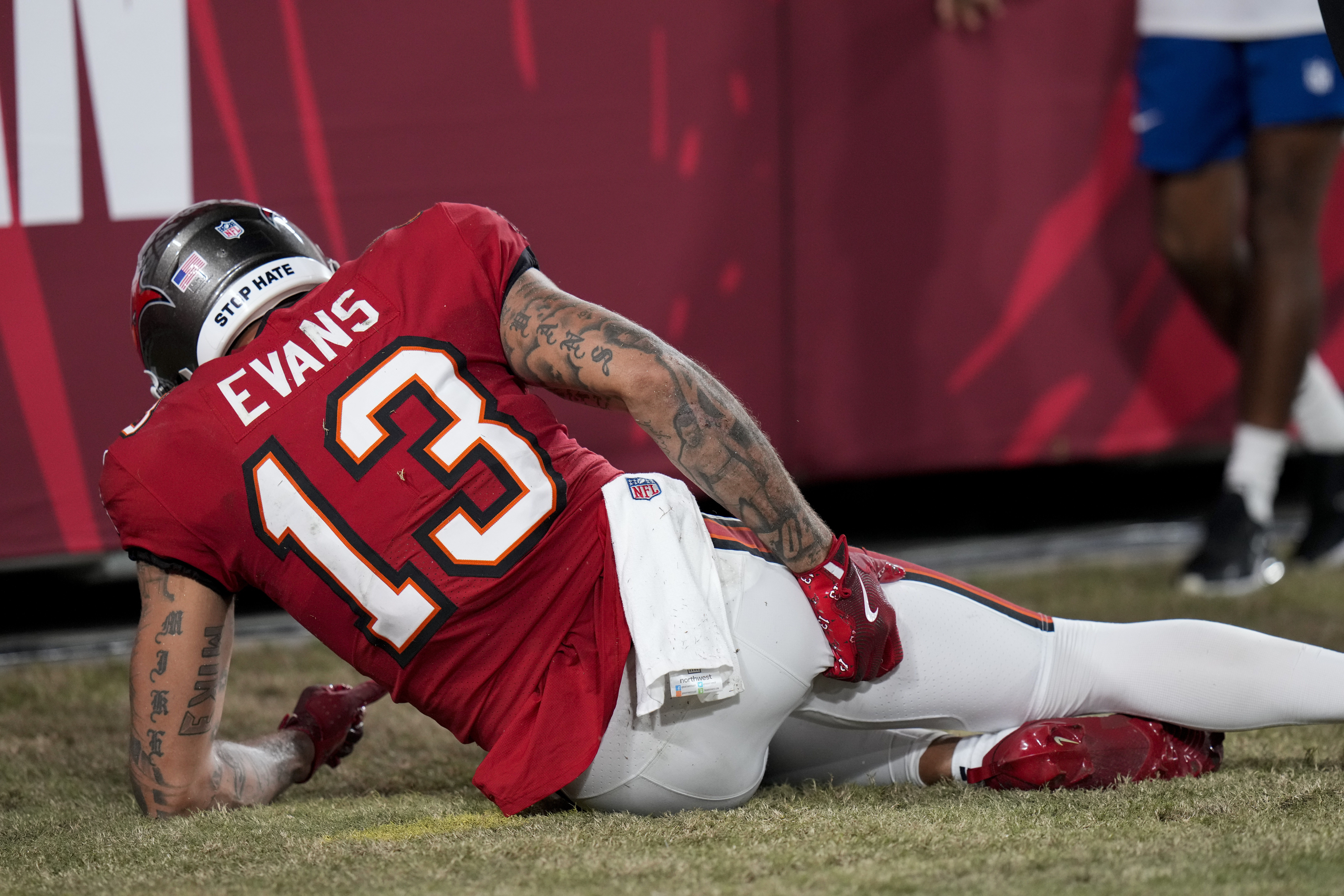 Tampa Bay Buccaneers wide receiver Mike Evans (13) reacts to an injury during the first half of an NFL football game against the Baltimore Ravens, Monday, Oct. 21, 2024, in Tampa, Fla.