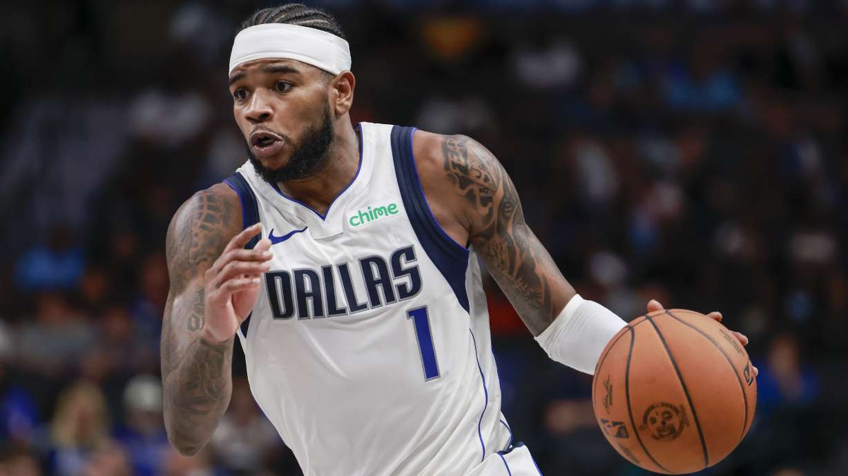 Dallas Mavericks guard Jaden Hardy drives to the basket during the first half of an NBA preseason basketball game against the Memphis Grizzlies in Dallas, Monday, Oct. 7, 2024.