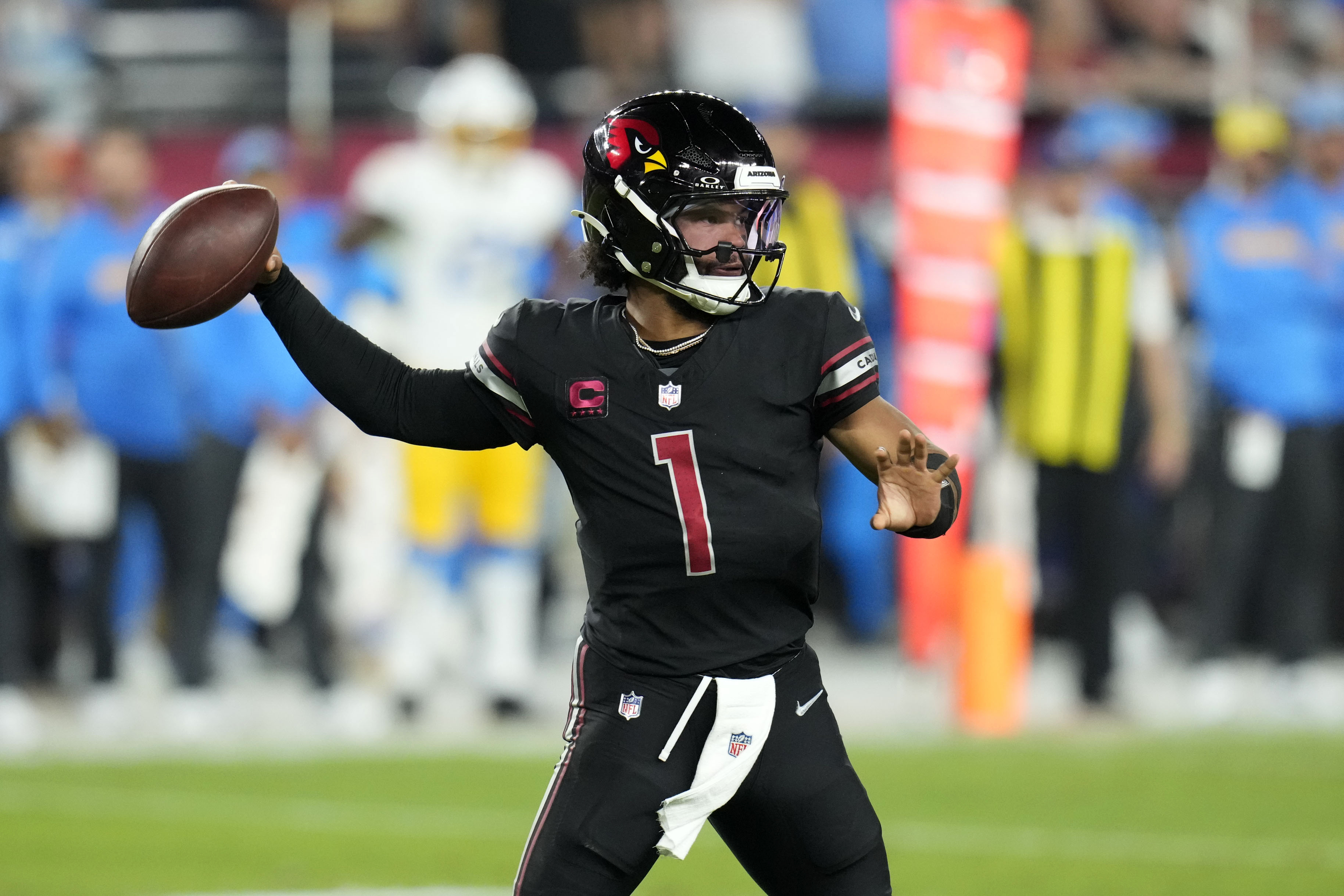 Arizona Cardinals quarterback Kyler Murray throws a pass during the first half of an NFL football game against the Los Angeles Chargers, Monday, Oct. 21, 2024, in Glendale Ariz.