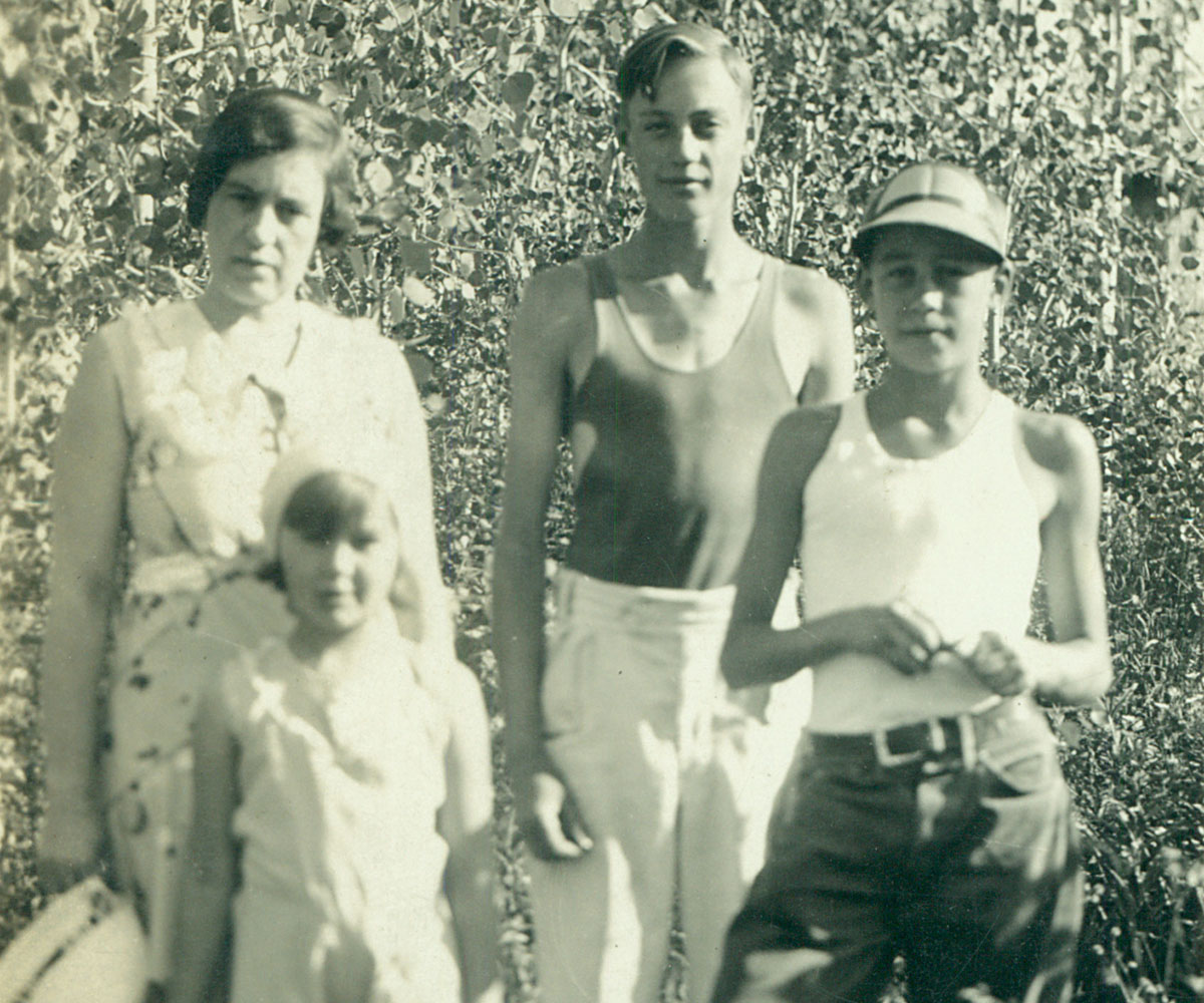 Lynn Simmons, right rear, stands with his younger brother William Simmons, right front, sister Carol, left front, and mother Mary Veneta, left rear, at Fish Lake in central Utah. This photo likely dates to the early 1930s.