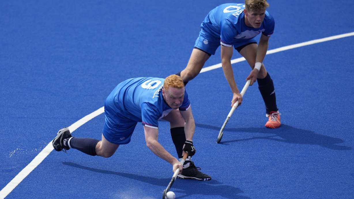 FILE - Scotland's Andrew McConnell shoots and scores goal against South Africa during their men's pool A hockey match at the Commonwealth Games in Birmingham, England, July 31, 2022. A scaled-back 2026 Commonwealth Games hosted by Glasgow will not feature rugby sevens, which was conceived in Scotland in the 1880s. Other sports that have also been dropped include field hockey, triathlon, badminton, Twenty20 cricket, squash, and diving.