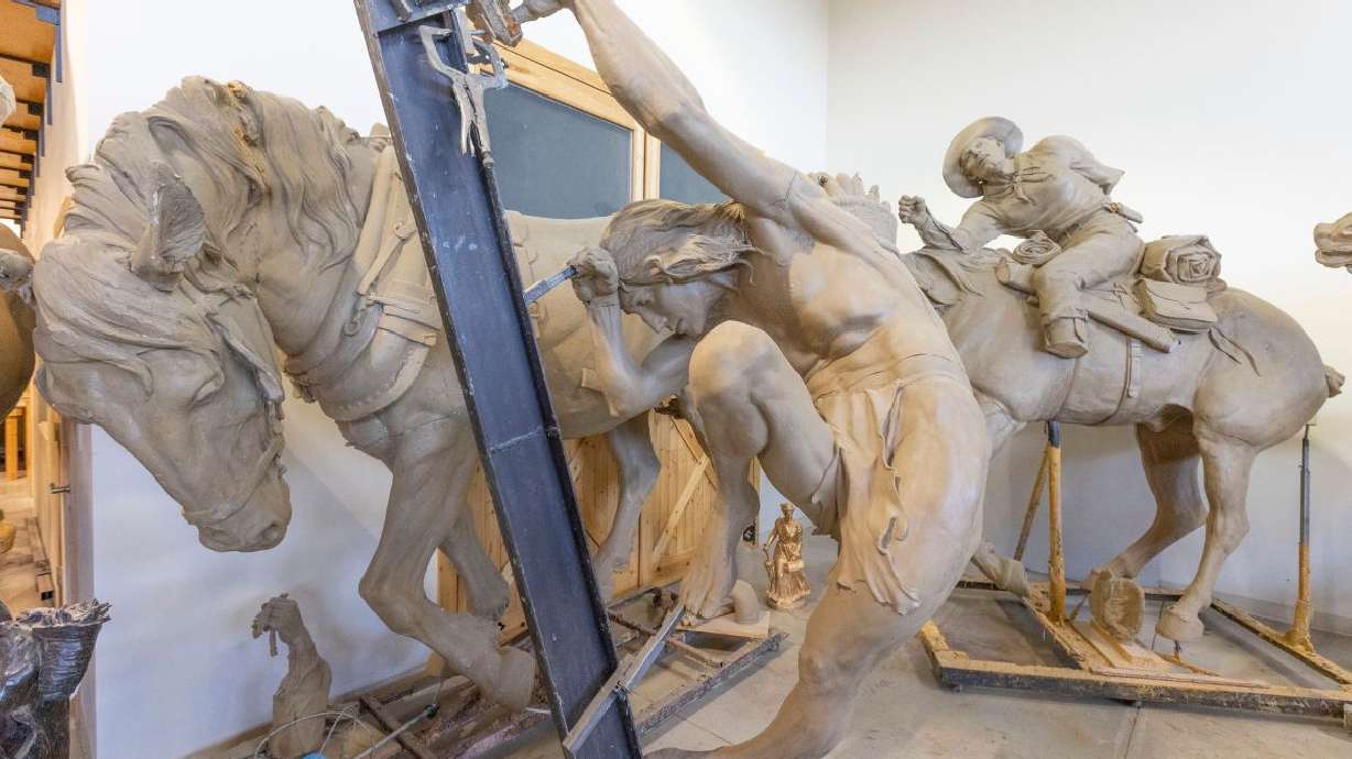 A sculpture that is part of a larger work called “The Ancient Ones (Anasazi),” which went on to become a 20-foot high monument at the entrance to Mesa Verde National Park in southwestern Colorado, sits in front of other sculptures at the late sculptor Edward Fraughton’s studio in West Jordan on Aug. 15.