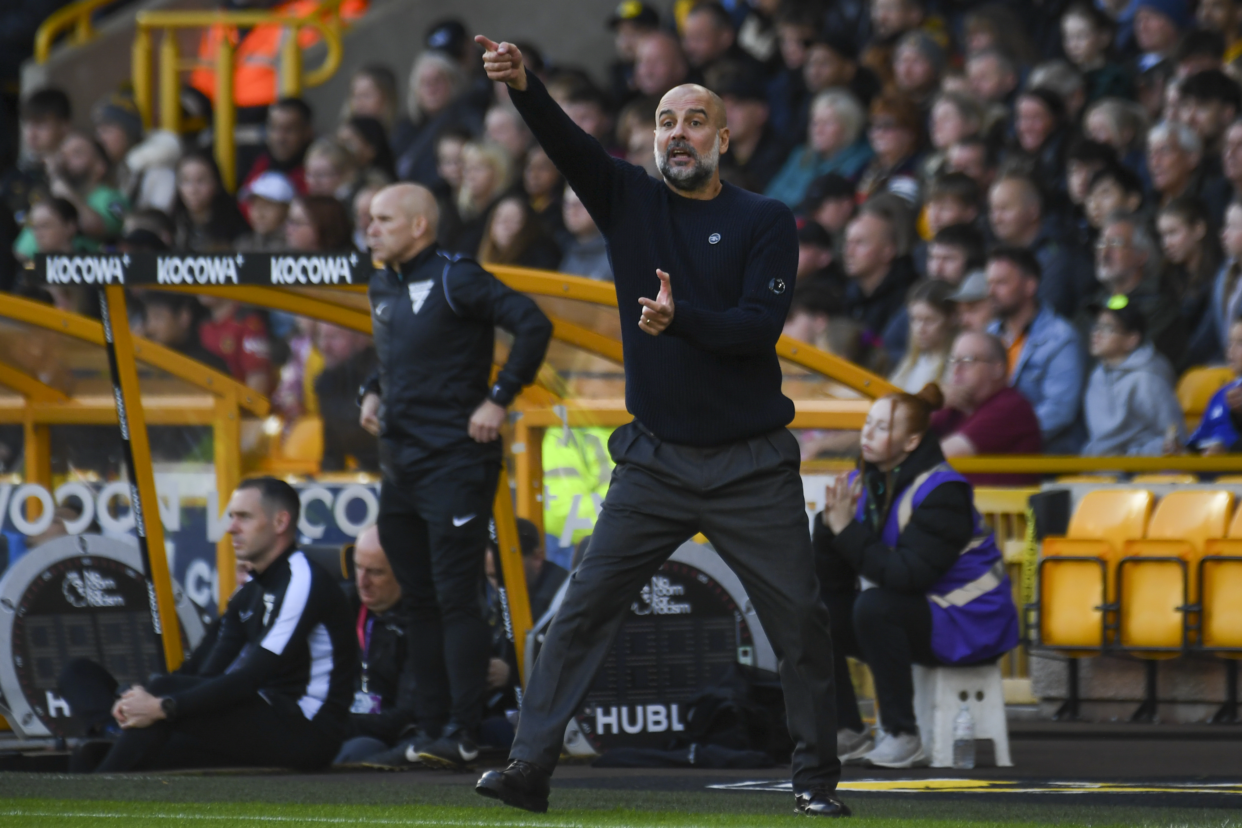 Manchester City's head coach Pep Guardiola gestures during the English Premier League soccer match between Wolverhampton Wanderers and Manchester City at the Molineux Stadium in Wolverhampton, England, Sunday, Oct. 20, 2024. 