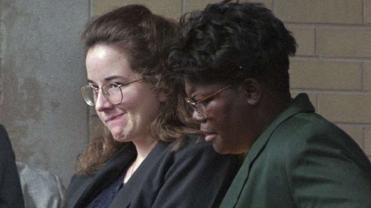 Convicted murderer Susan Smith is escorted from the Union County Courthouse on July 28, 1995, by corrections officer Felicia Mungo after being sentenced to life in prison for the drowning deaths of her two boys. Smith will be up for parole next month.