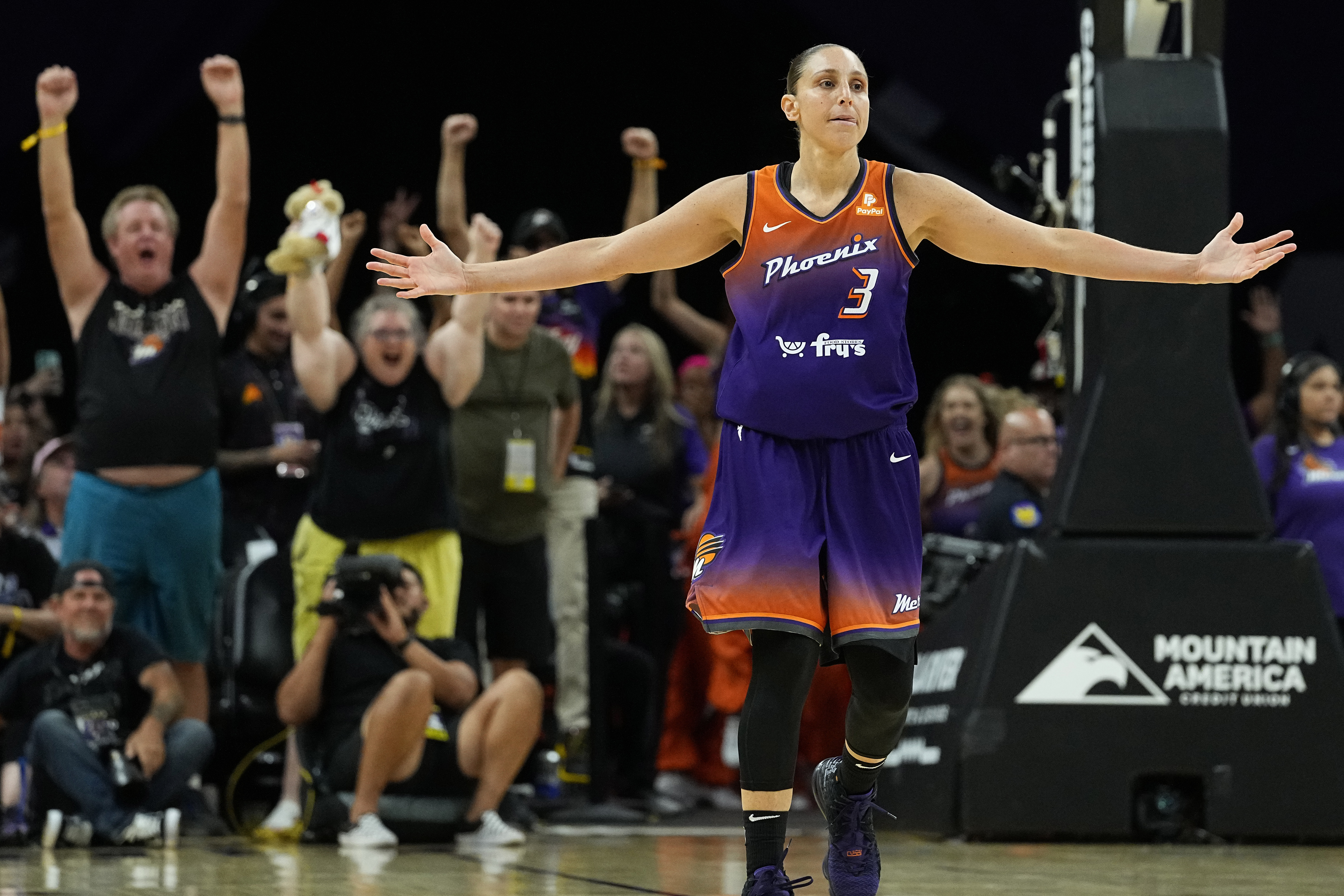 FILE - Phoenix Mercury's Diana Taurasi (3) celebrates after making her 10,000th career point, during the second half of a WNBA basketball game against the Atlanta Dream, Thursday, Aug. 3, 2023, in Phoenix.