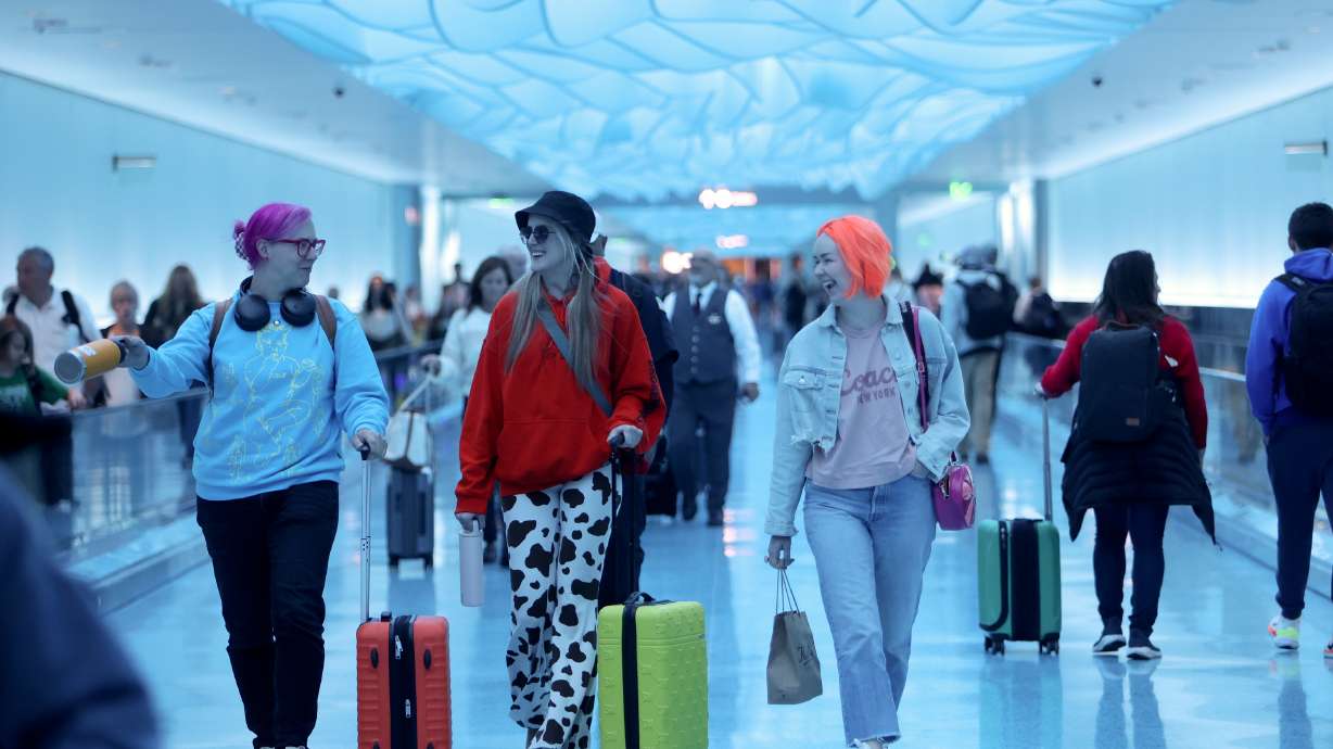 People walk at the Salt Lake City International Airport on Oct. 22, 2024. The airport brought in more than 28 million travelers last year.