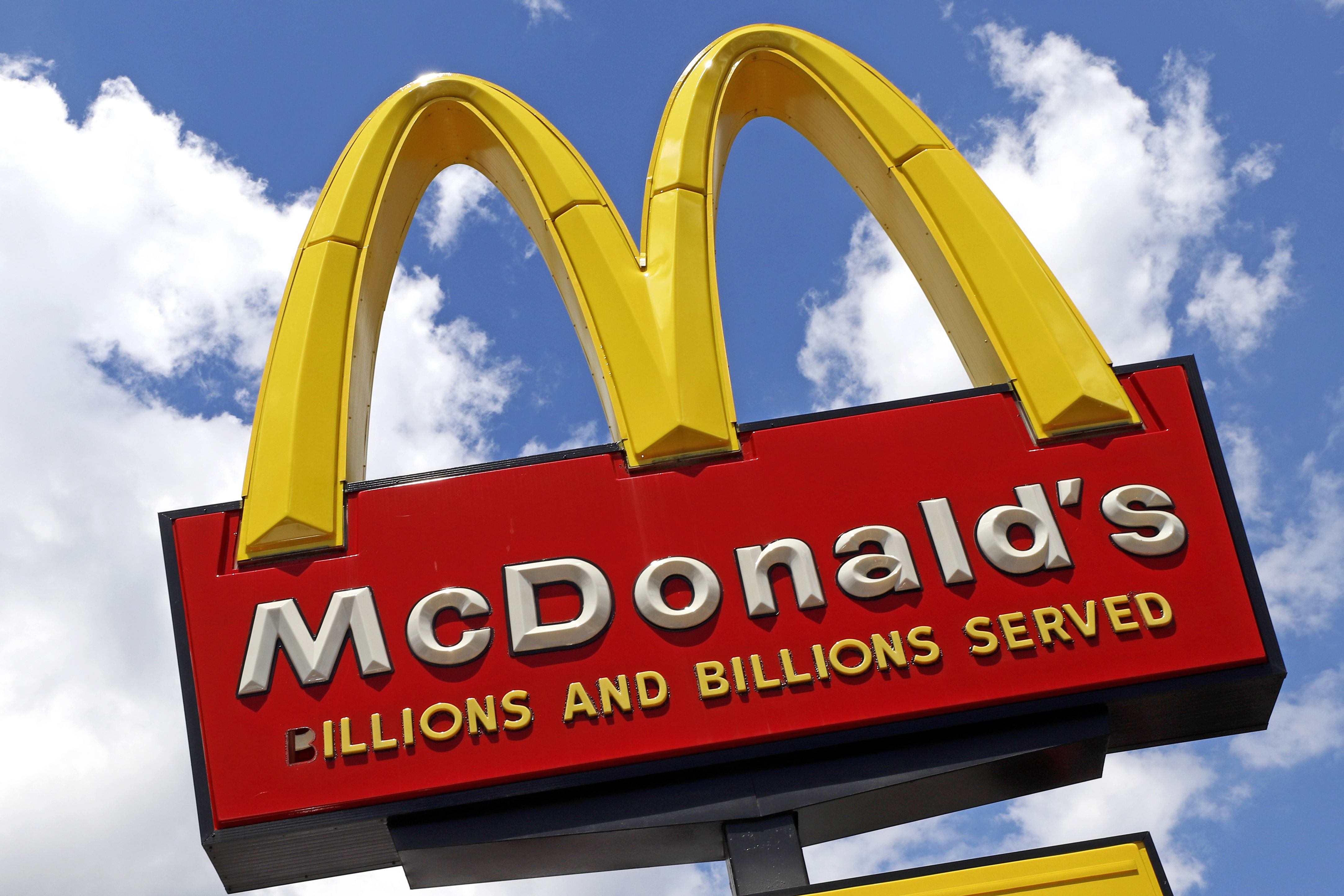 Federal officials say E. coli food poisoning linked to McDonald's Quarter Pounder hamburgers has sickened at least 49 people in 10 states, including Utah.