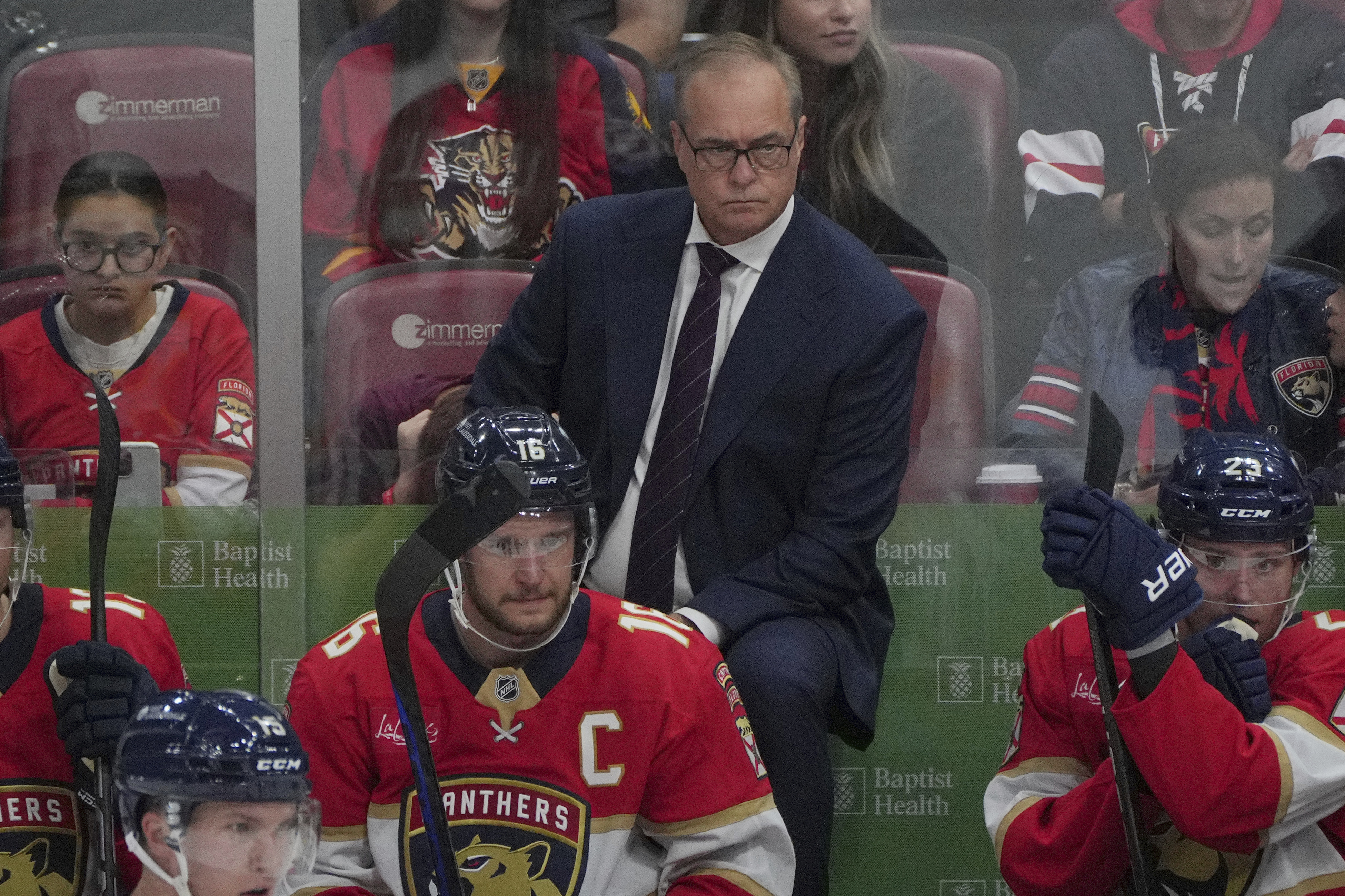 Florida Panthers head coach Paul Maurice keeps an eye on his team during the third period of an NHL hockey game against the Boston Bruins, Tuesday, Oct. 8, 2024, in Sunrise, Fla.