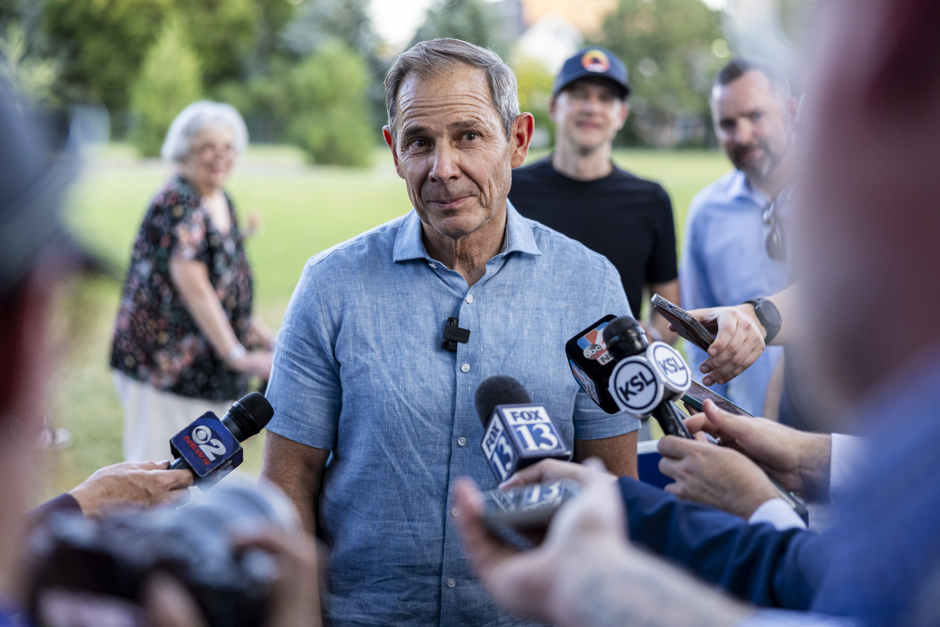 John Curtis talks with members of the media at Riverview Park in Provo on June 25. Curtis has been at the center of a sea change in conservative climate politics, and hopes to continue his approach in the U.S. Senate.