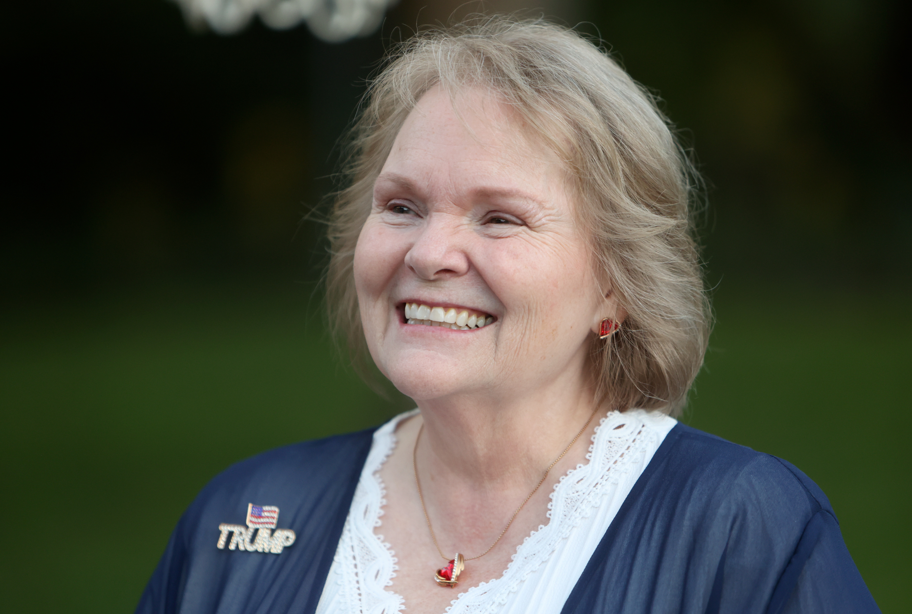 Lynette Jensen smiles while attending a meet and greet with Gov. Spencer Cox in Ogden on Monday.