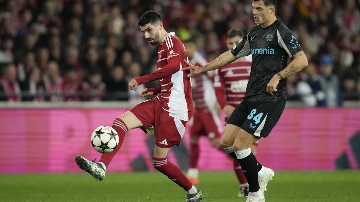 Brest's Pierre Lees-Melou passes the ball in front of Leverkusen's Granit Xhaka during the Champions League opening phase soccer match between Brest and Bayer Leverkusen in Guingamp, western France, Wednesday, Oct. 23, 2024.