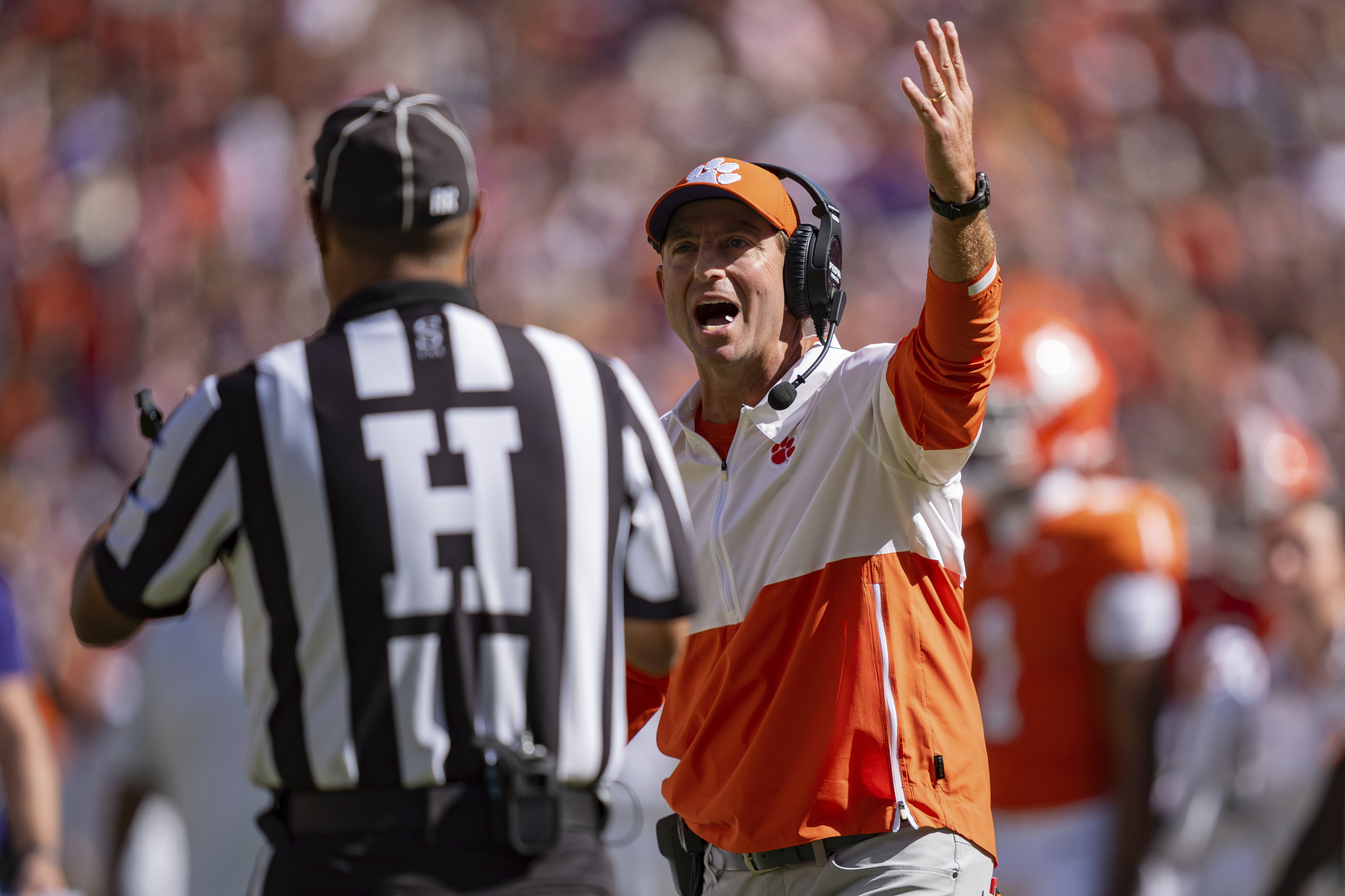 Clemson head coach Dabo Swinney reacts towards an official in the first half of an NCAA college football game against Virginia, Saturday, Oct. 19, 2024, in Clemson, S.C.