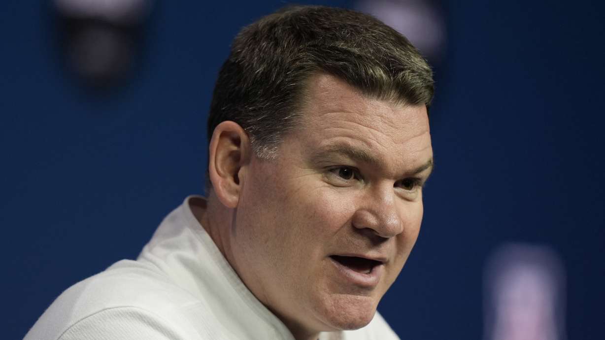 Arizona head coach Tommy Lloyd addresses the media during the NCAA college Big 12 men's basketball media day, Wednesday, Oct. 23, 2024, in Kansas City, Mo.