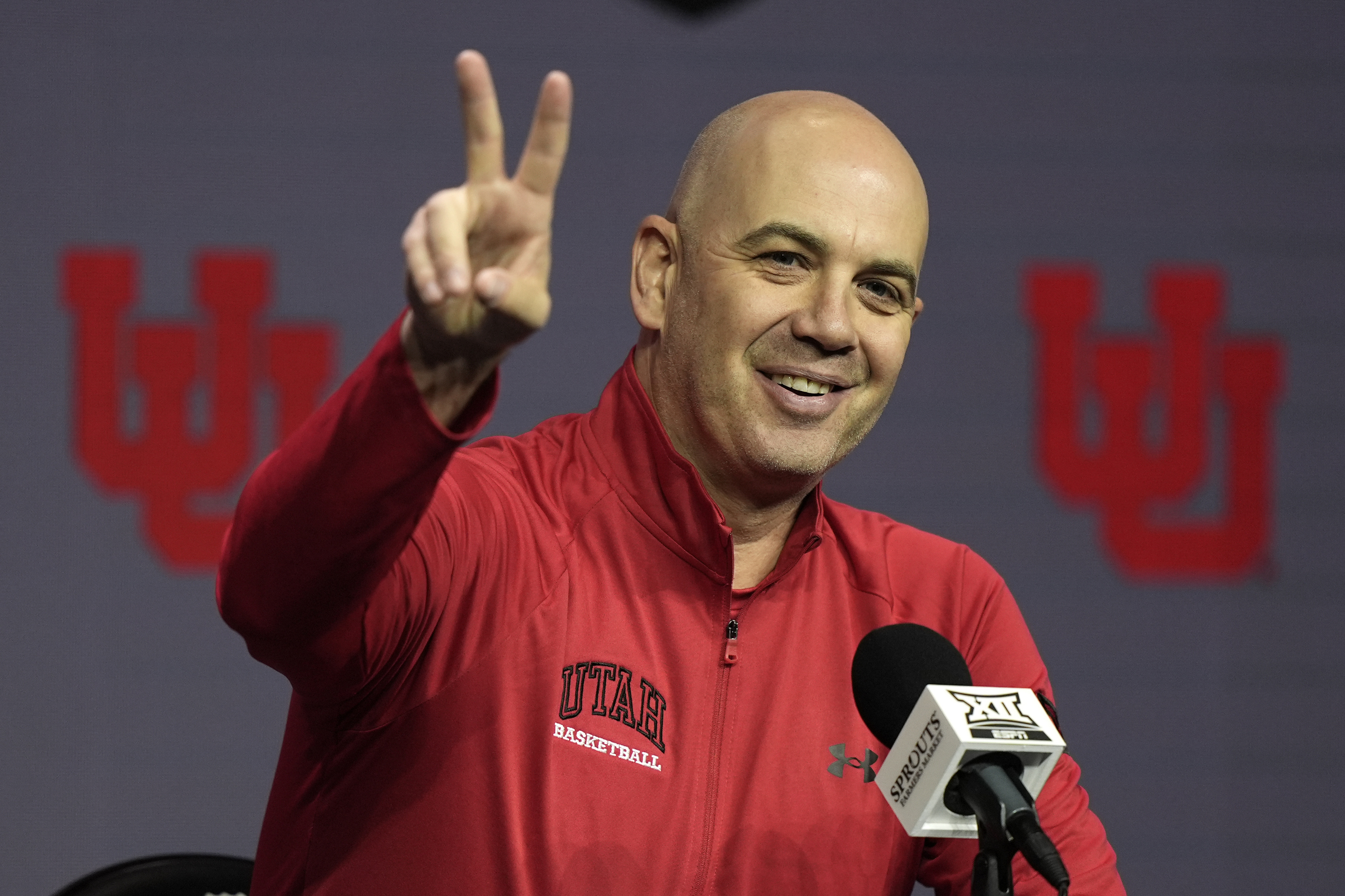 Utah head coach Craig Smith addresses the media during the NCAA college Big 12 men's basketball media day, Wednesday, Oct. 23, 2024, in Kansas City, Mo. 